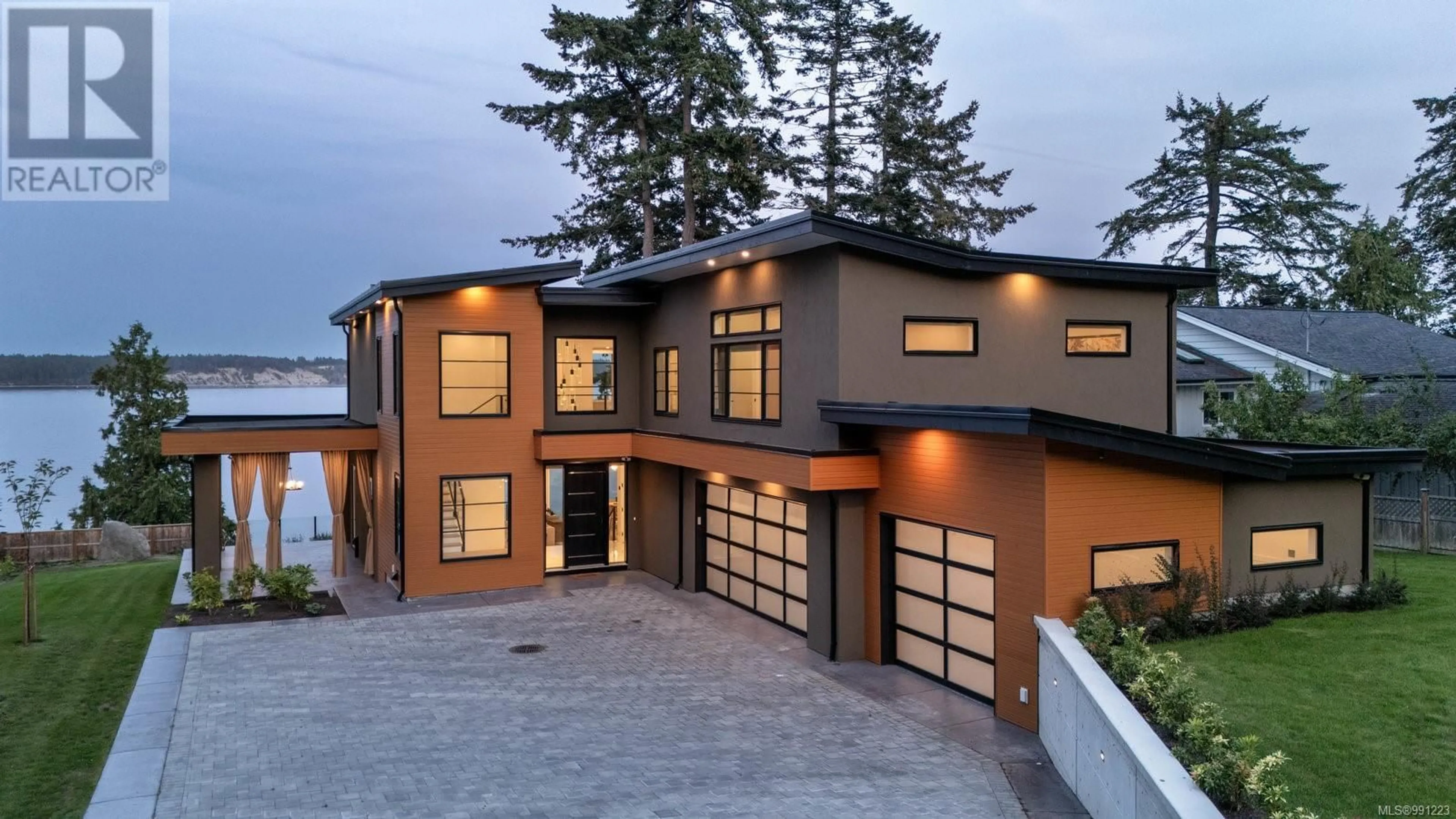 Home with brick exterior material, street for 8213 Lochside Dr, Central Saanich British Columbia V8M1T9