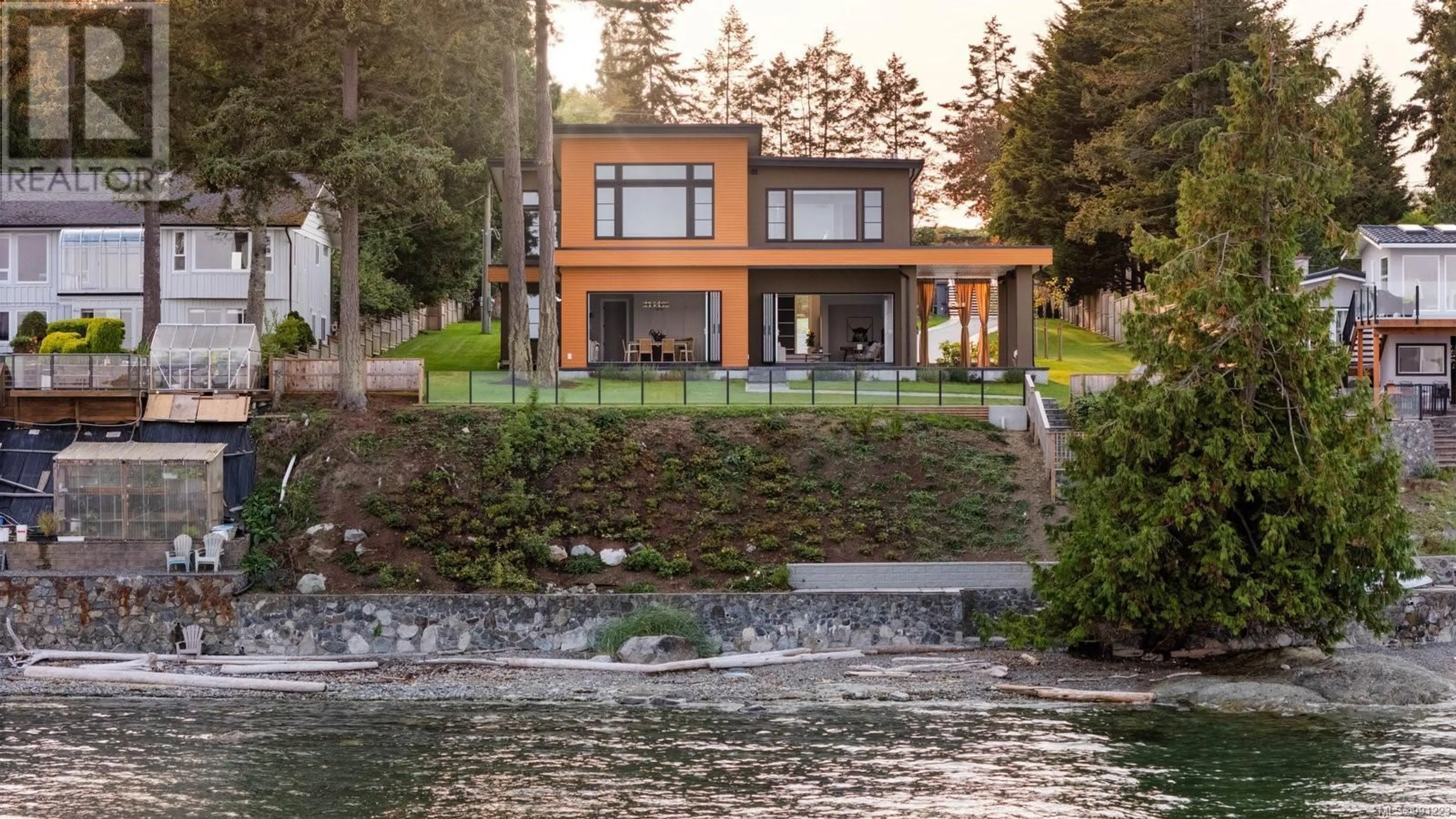 Home with brick exterior material, water/lake/river/ocean view for 8213 Lochside Dr, Central Saanich British Columbia V8M1T9