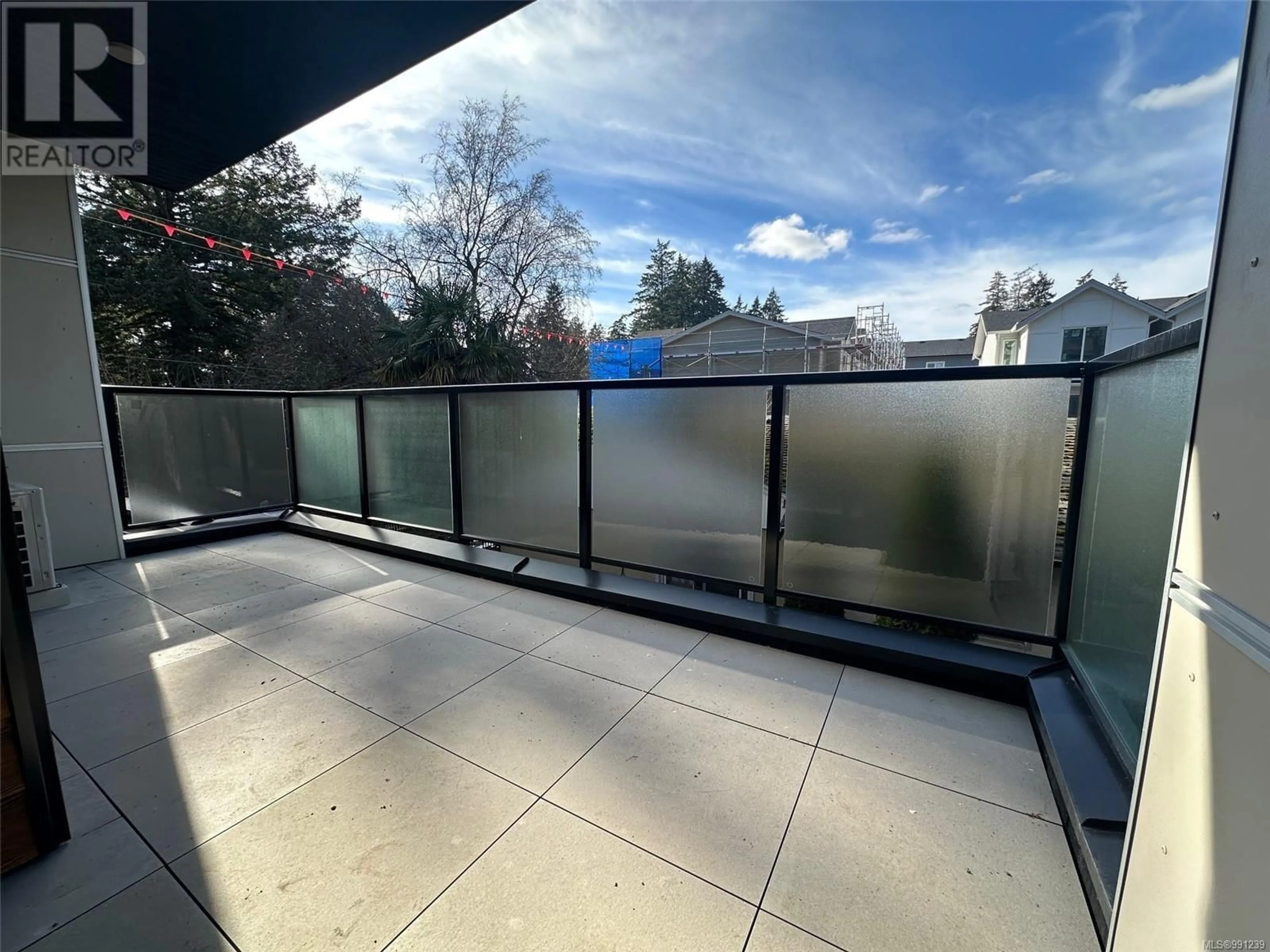 Balcony in the apartment, city buildings view from balcony for 205 - 924 JENKINS AVENUE, Langford British Columbia V9B2N7