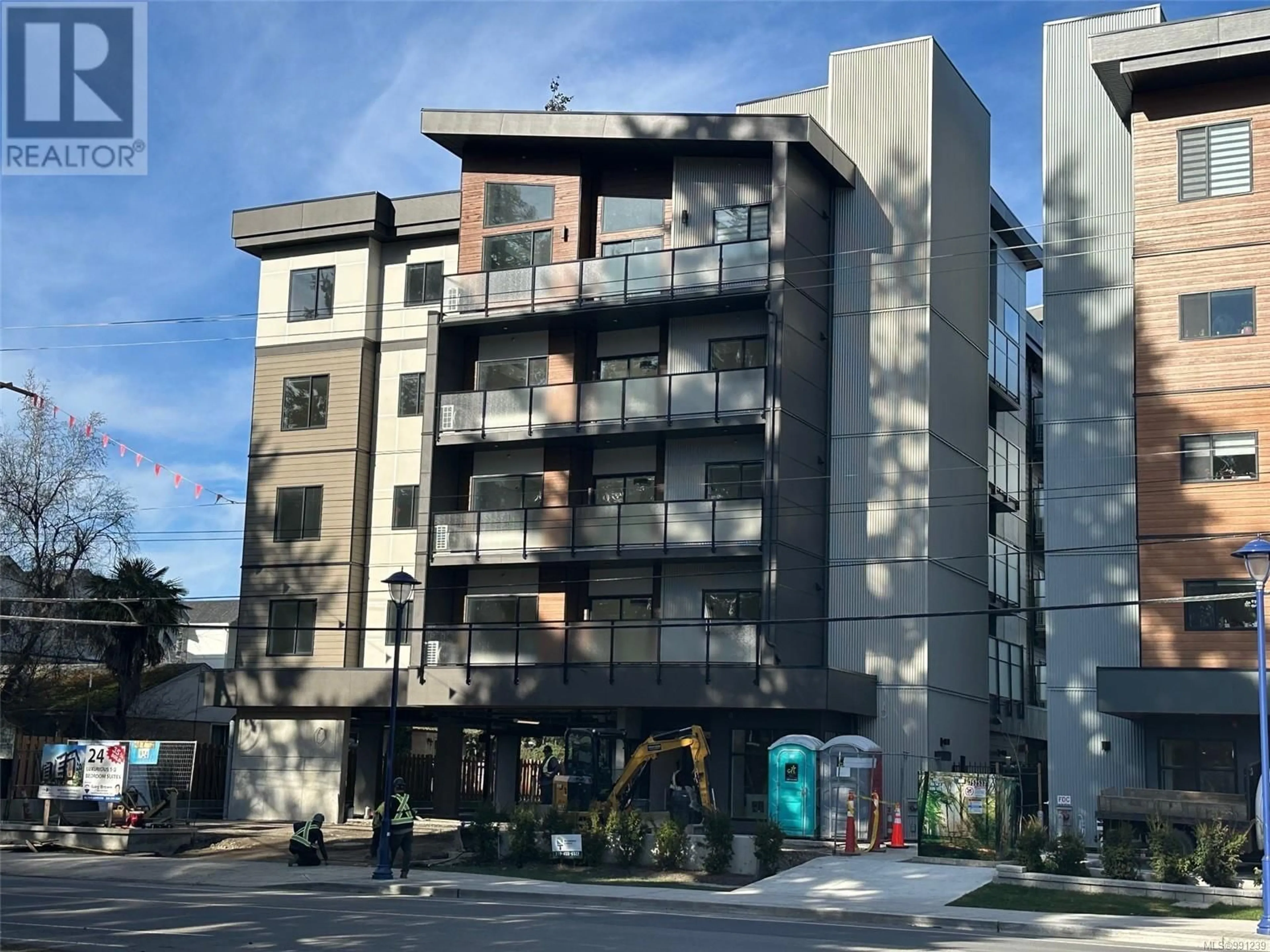 A pic from outside/outdoor area/front of a property/back of a property/a pic from drone, street for 205 - 924 JENKINS AVENUE, Langford British Columbia V9B2N7