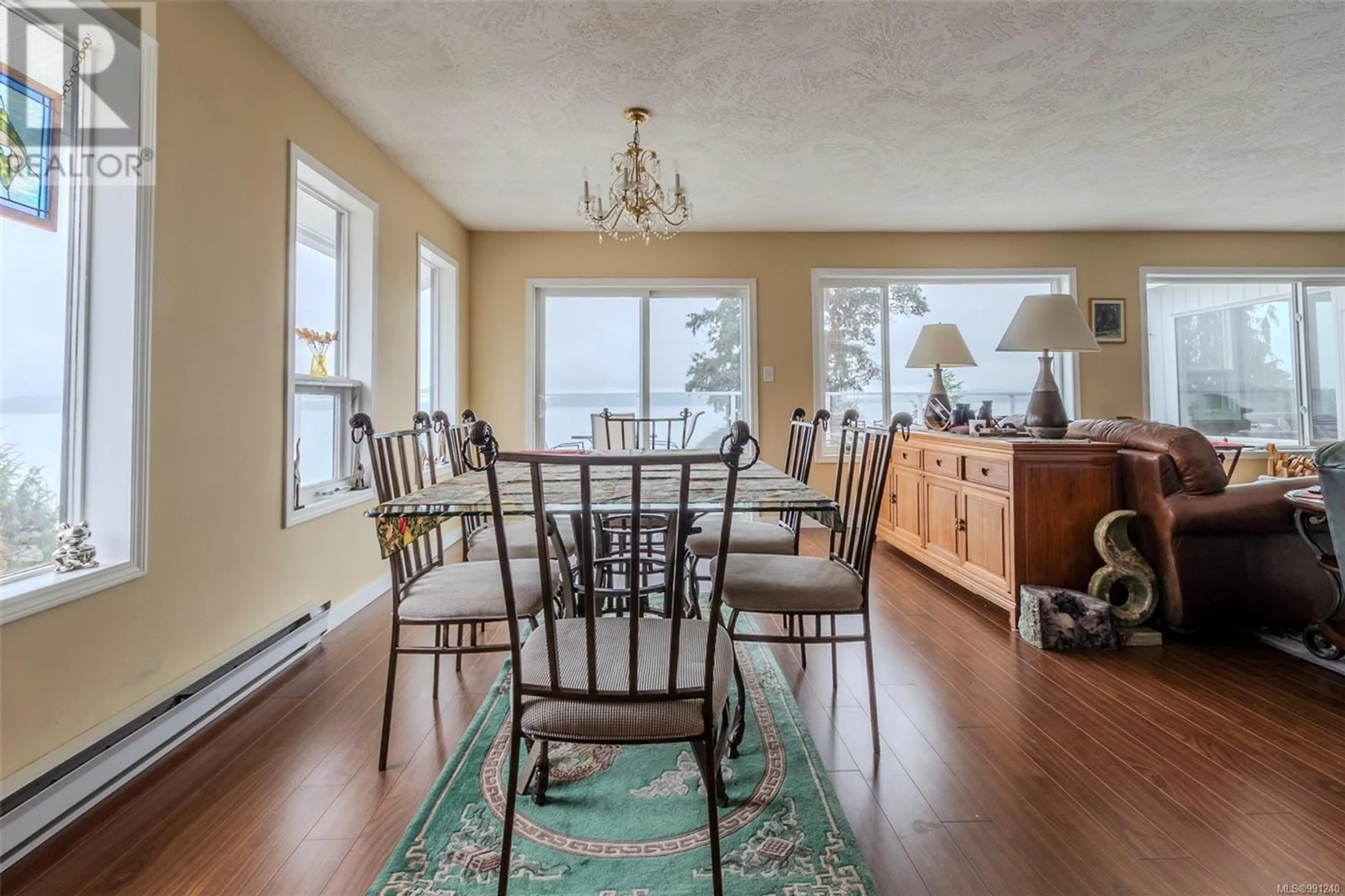 Dining room, wood/laminate floor for 10043 BEACH DRIVE, Chemainus British Columbia V0R1K1