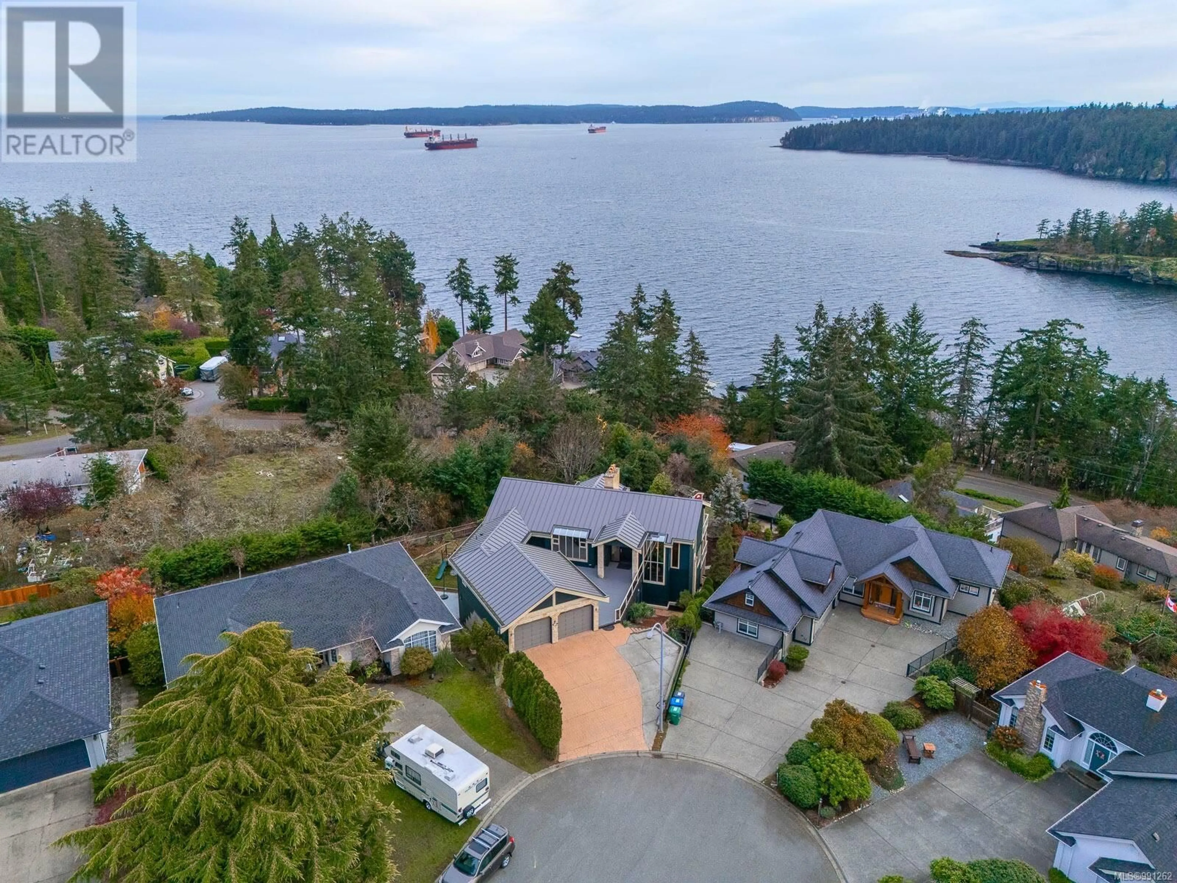 A pic from outside/outdoor area/front of a property/back of a property/a pic from drone, water/lake/river/ocean view for 3279 Shearwater Dr, Nanaimo British Columbia V9T6A1