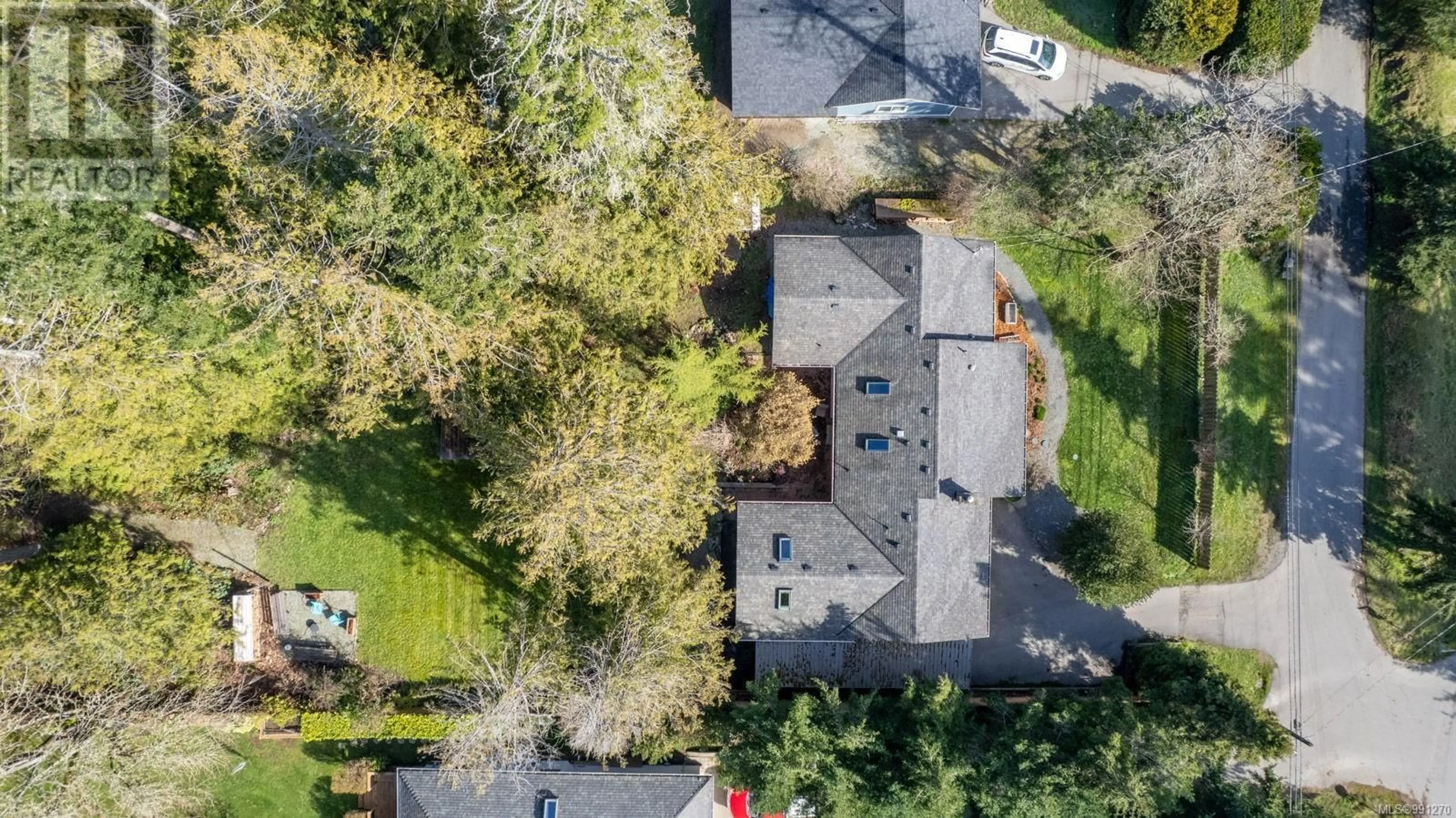 A pic from outside/outdoor area/front of a property/back of a property/a pic from drone, street for 1680 WAIN ROAD, North Saanich British Columbia V8L5R2