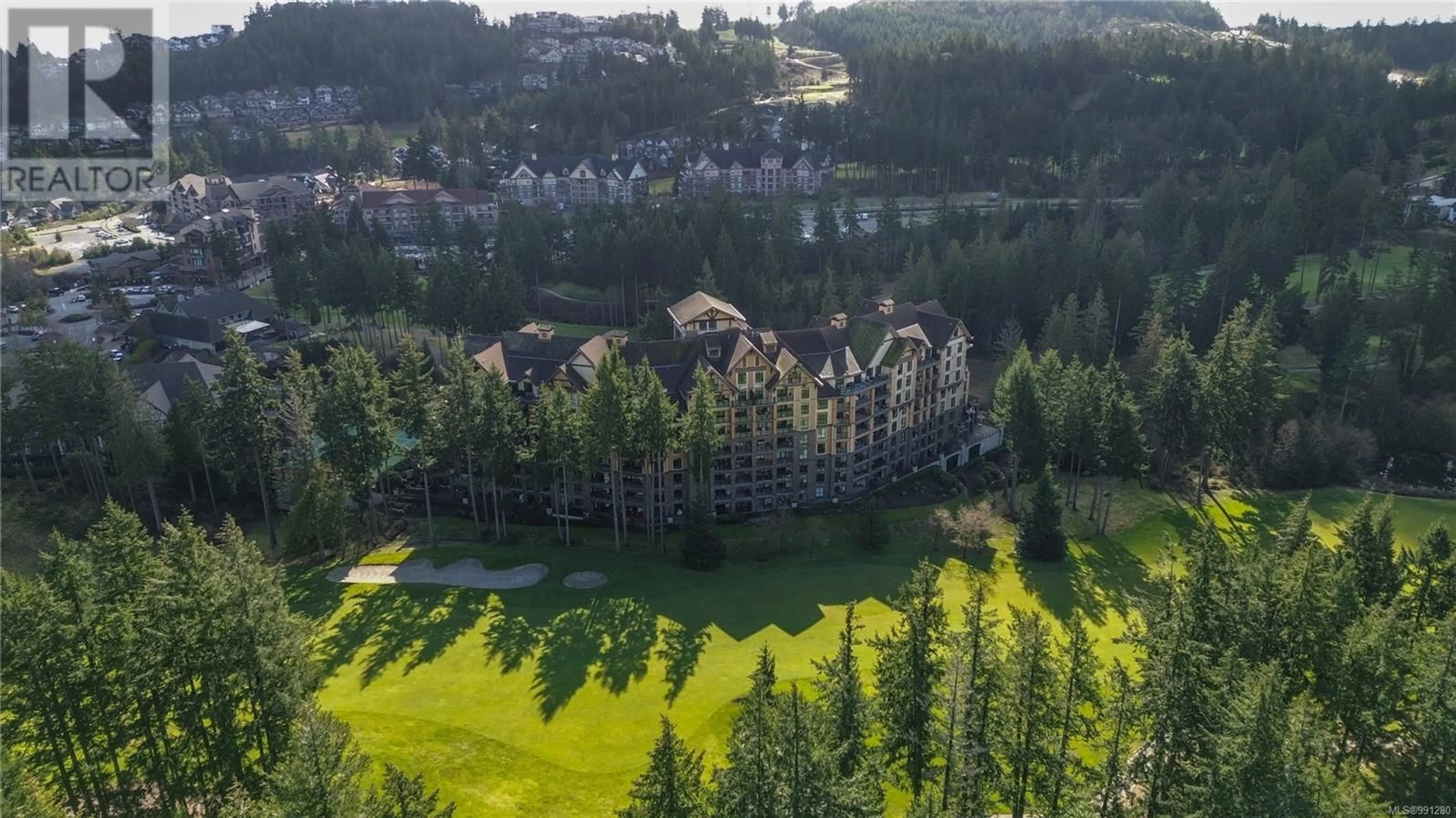 A pic from outside/outdoor area/front of a property/back of a property/a pic from drone, forest/trees view for 315 1400 Lynburne Pl, Langford British Columbia V9B0A4