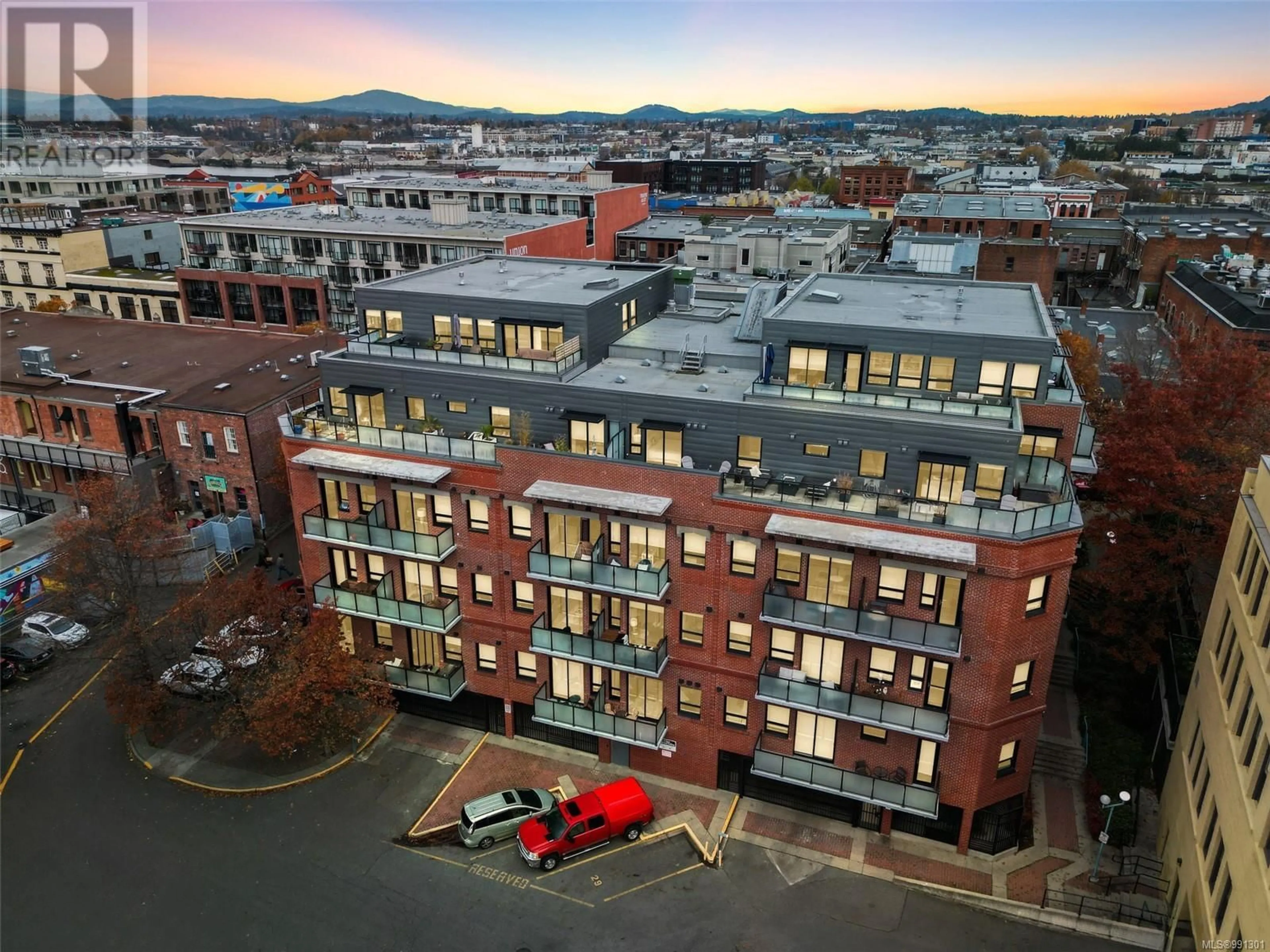 A pic from outside/outdoor area/front of a property/back of a property/a pic from drone, city buildings view from balcony for 405 595 Pandora Ave, Victoria British Columbia V8W1N5