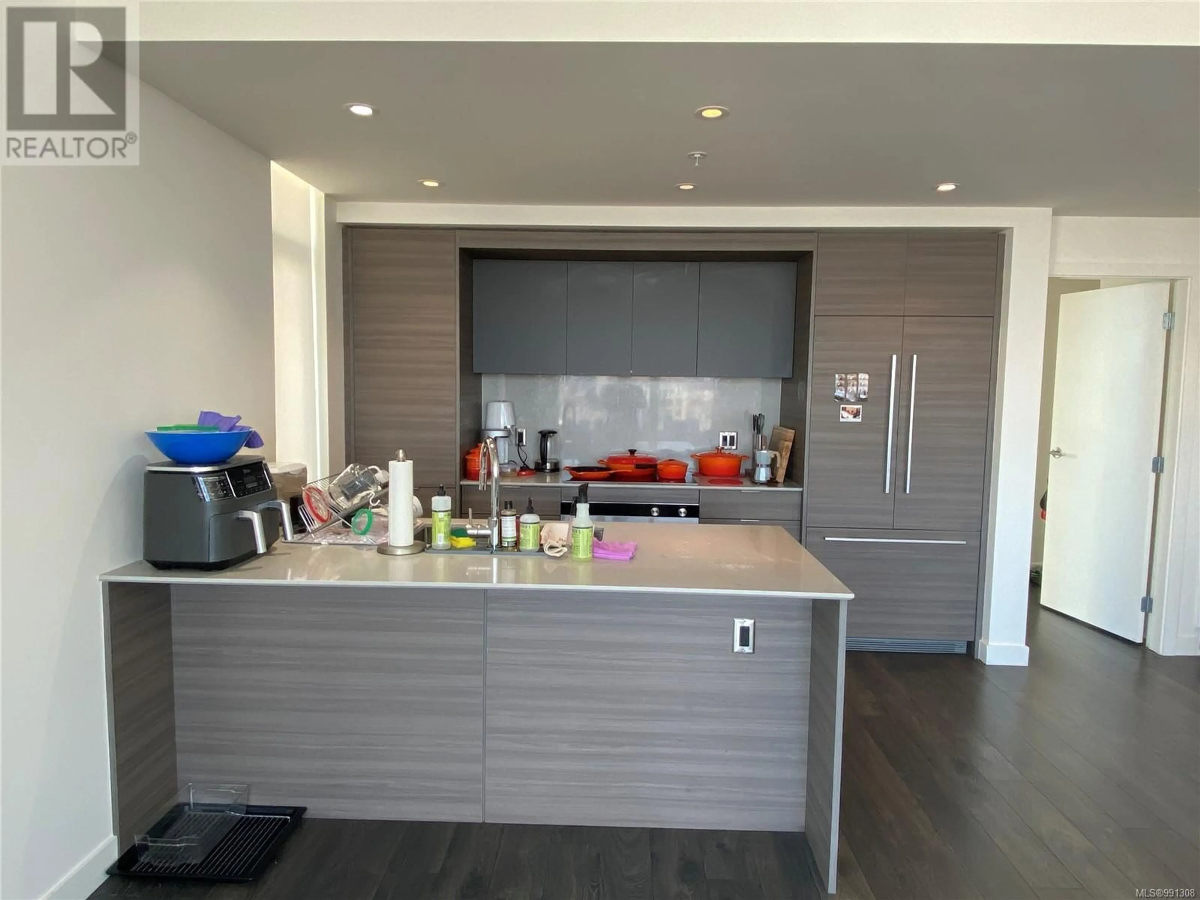 Open concept kitchen, unknown for 1702 848 Yates St, Victoria British Columbia V8W0G2