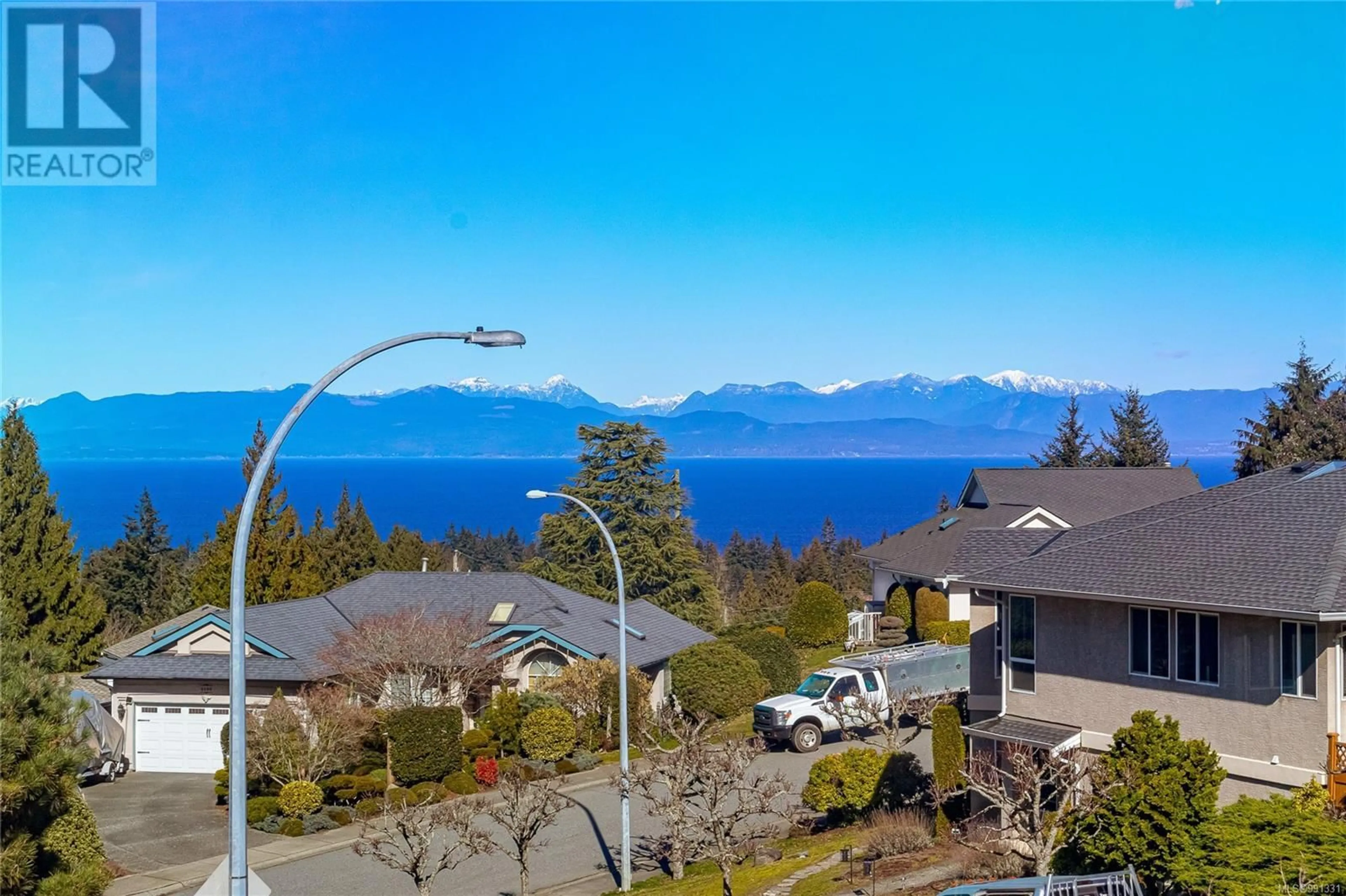 A pic from outside/outdoor area/front of a property/back of a property/a pic from drone, water/lake/river/ocean view for 5413 Kenwill Dr, Nanaimo British Columbia V9T5Z6