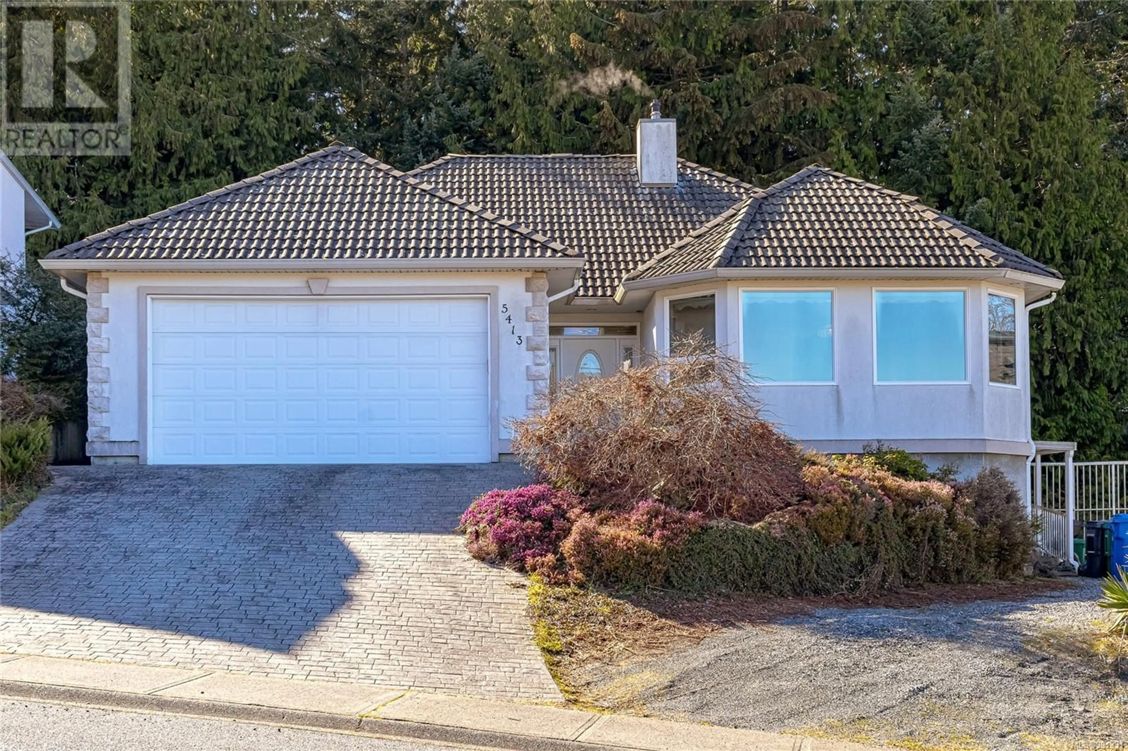 A pic from outside/outdoor area/front of a property/back of a property/a pic from drone, street for 5413 Kenwill Dr, Nanaimo British Columbia V9T5Z6