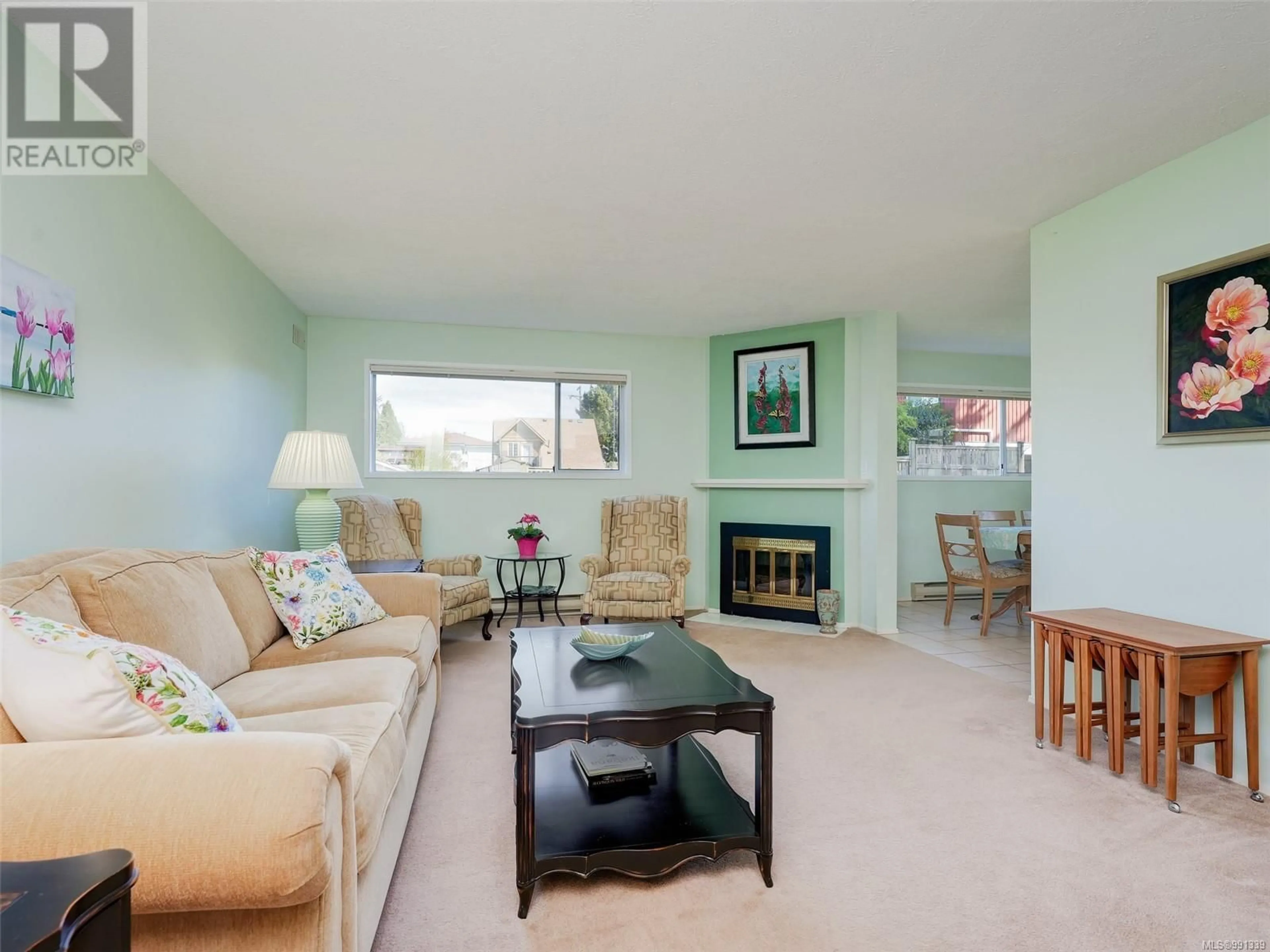 Living room with furniture, unknown for 103 - 2354 BRETHOUR AVENUE, Sidney British Columbia V8L2A5