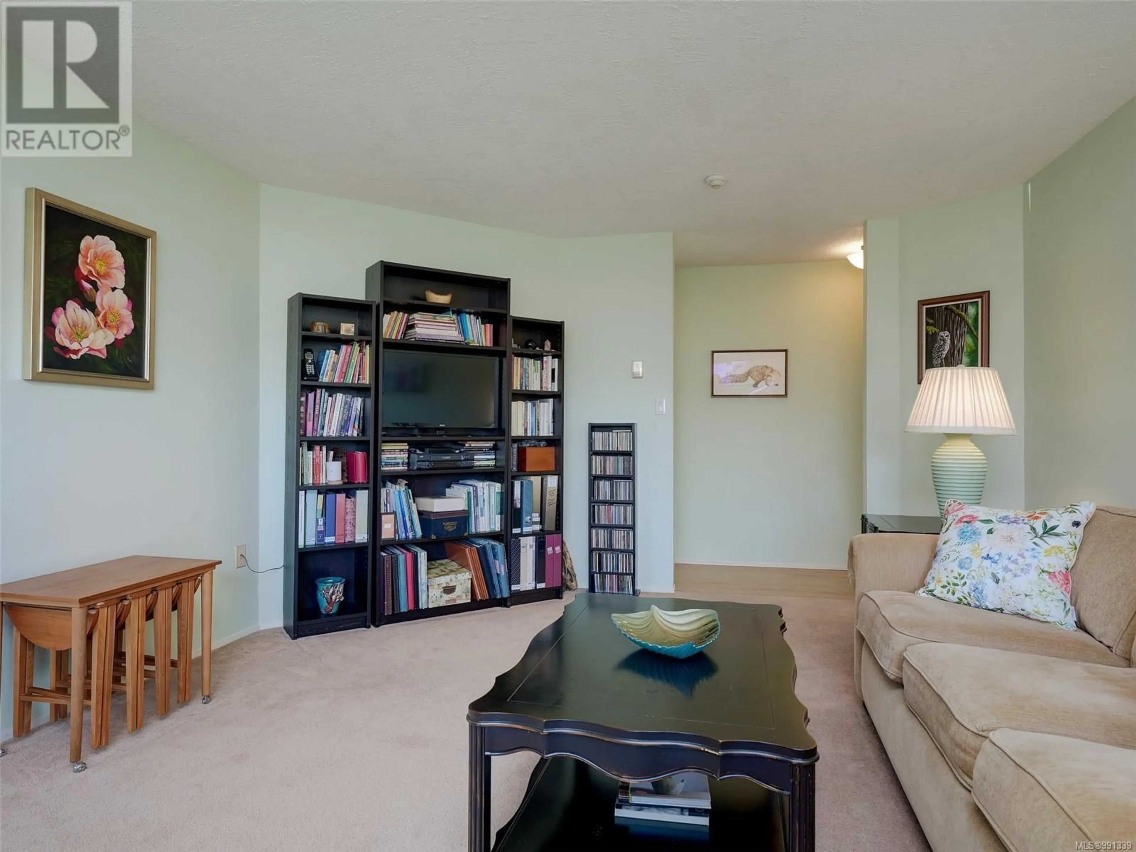 Living room with furniture, unknown for 103 - 2354 BRETHOUR AVENUE, Sidney British Columbia V8L2A5