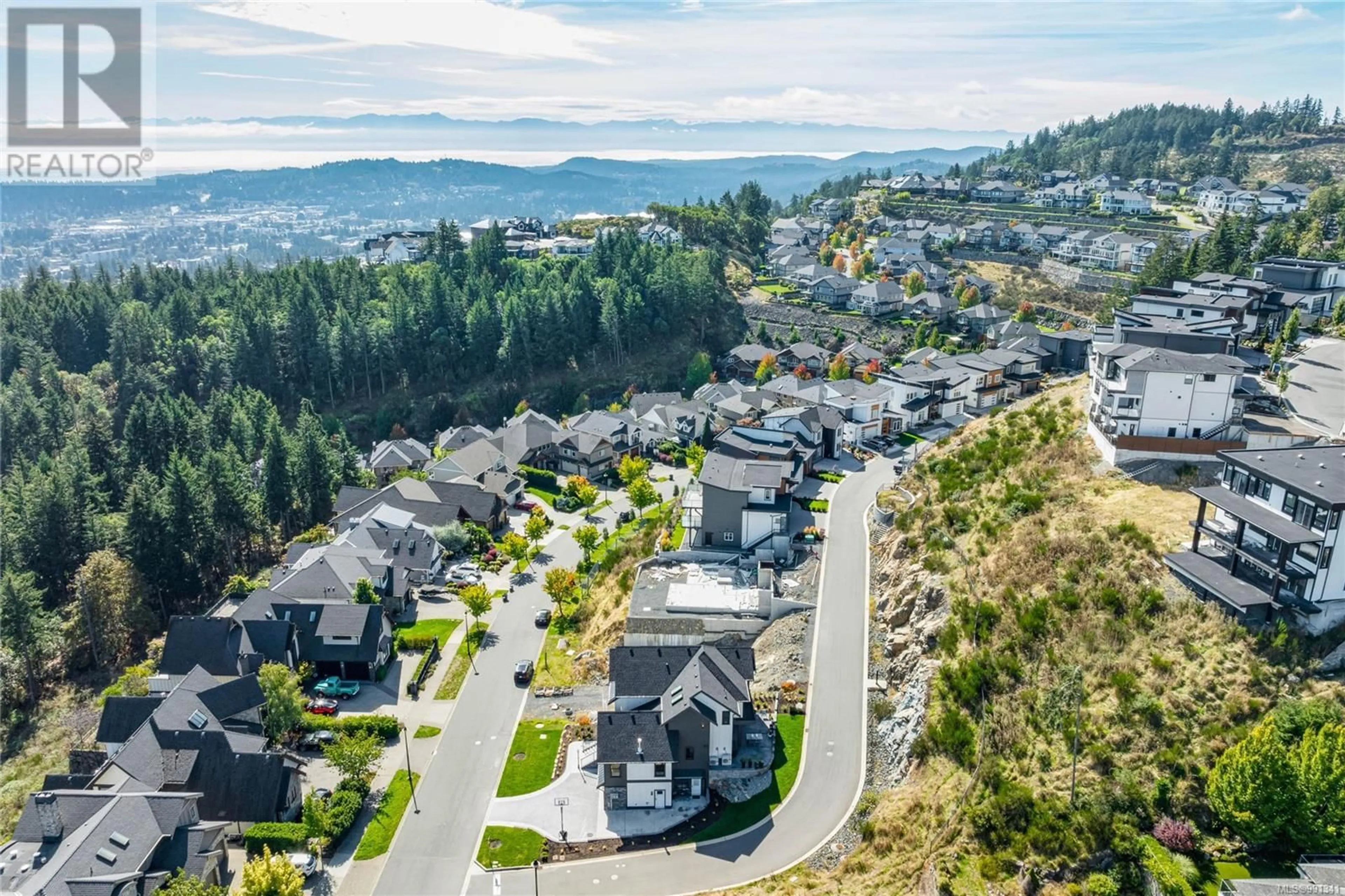 A pic from outside/outdoor area/front of a property/back of a property/a pic from drone, mountain view for 2174 Spirit Ridge Dr, Langford British Columbia V9B0B5