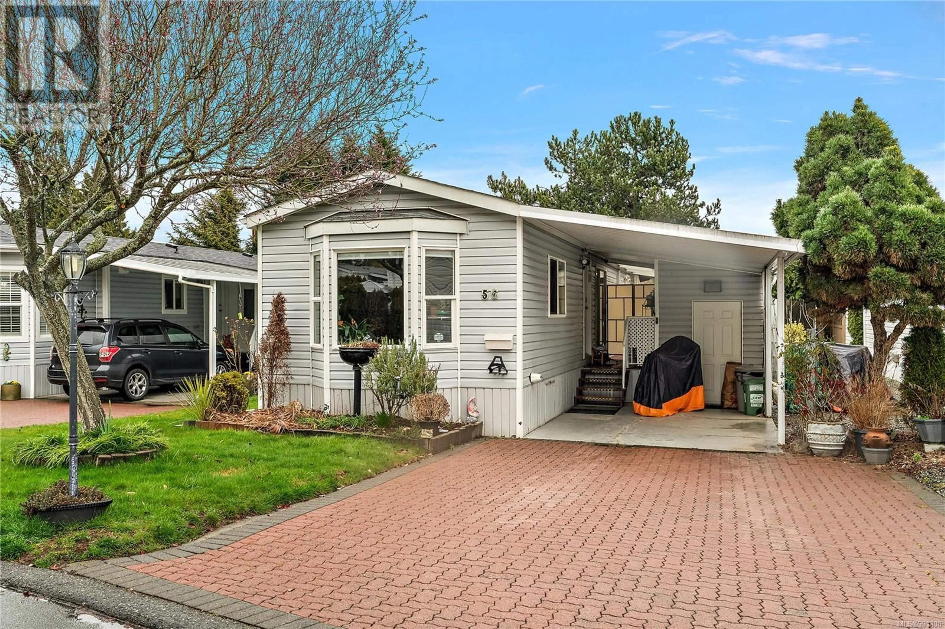 Home with vinyl exterior material, street for 56 - 7583 CENTRAL SAANICH ROAD, Central Saanich British Columbia V8M2B6