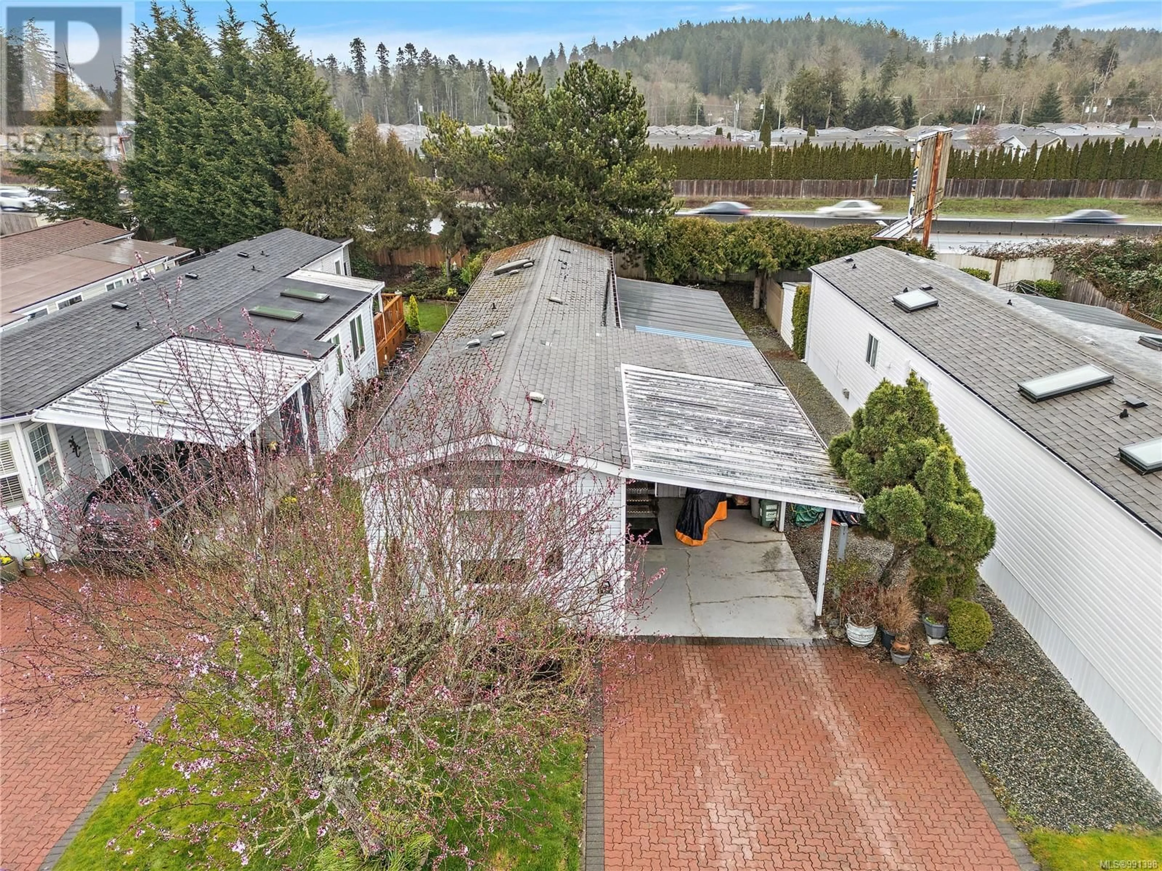 A pic from outside/outdoor area/front of a property/back of a property/a pic from drone, unknown for 56 - 7583 CENTRAL SAANICH ROAD, Central Saanich British Columbia V8M2B6