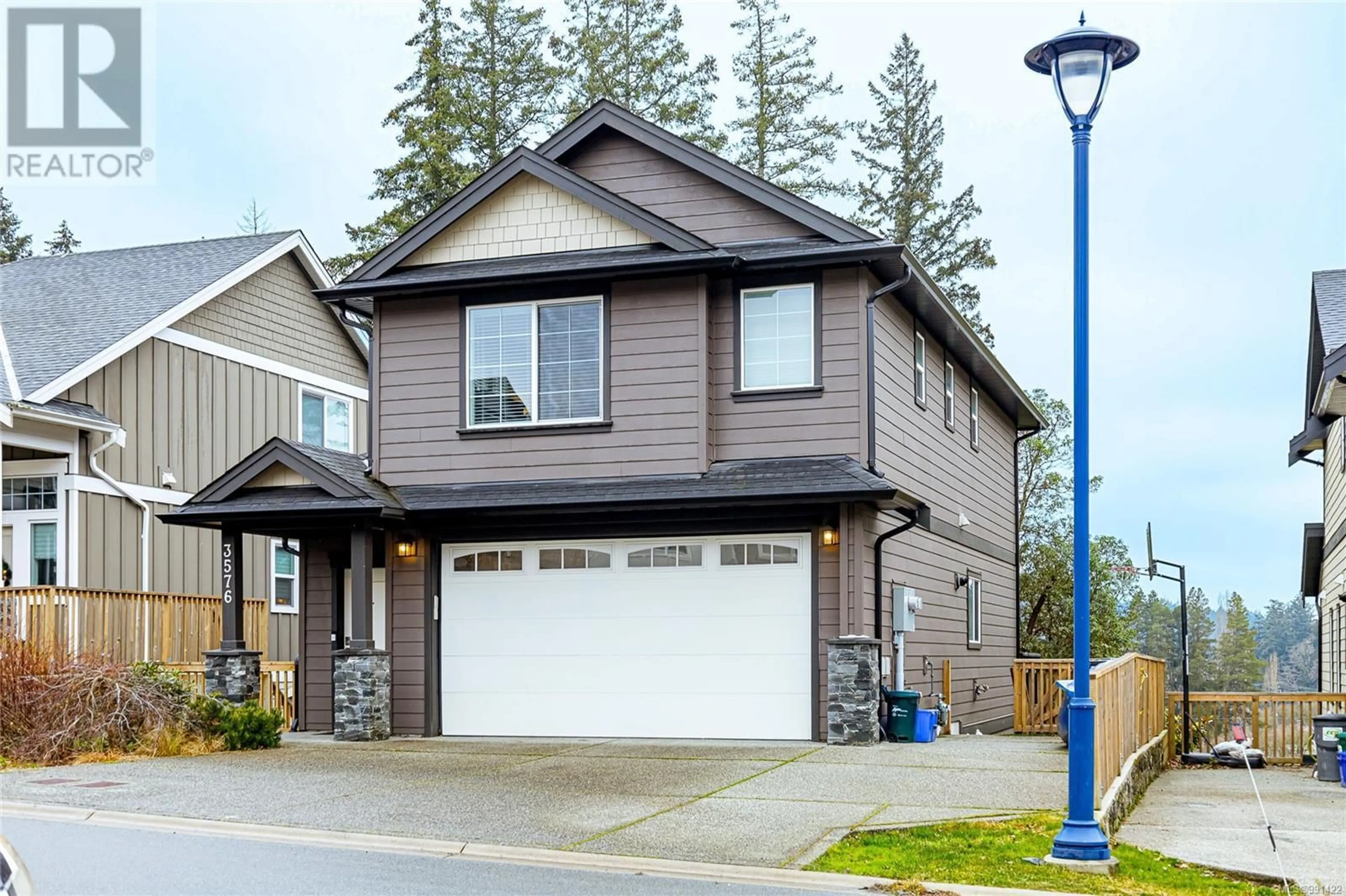 Home with vinyl exterior material, street for 3576 Honeycrisp Ave, Langford British Columbia V9C0N5