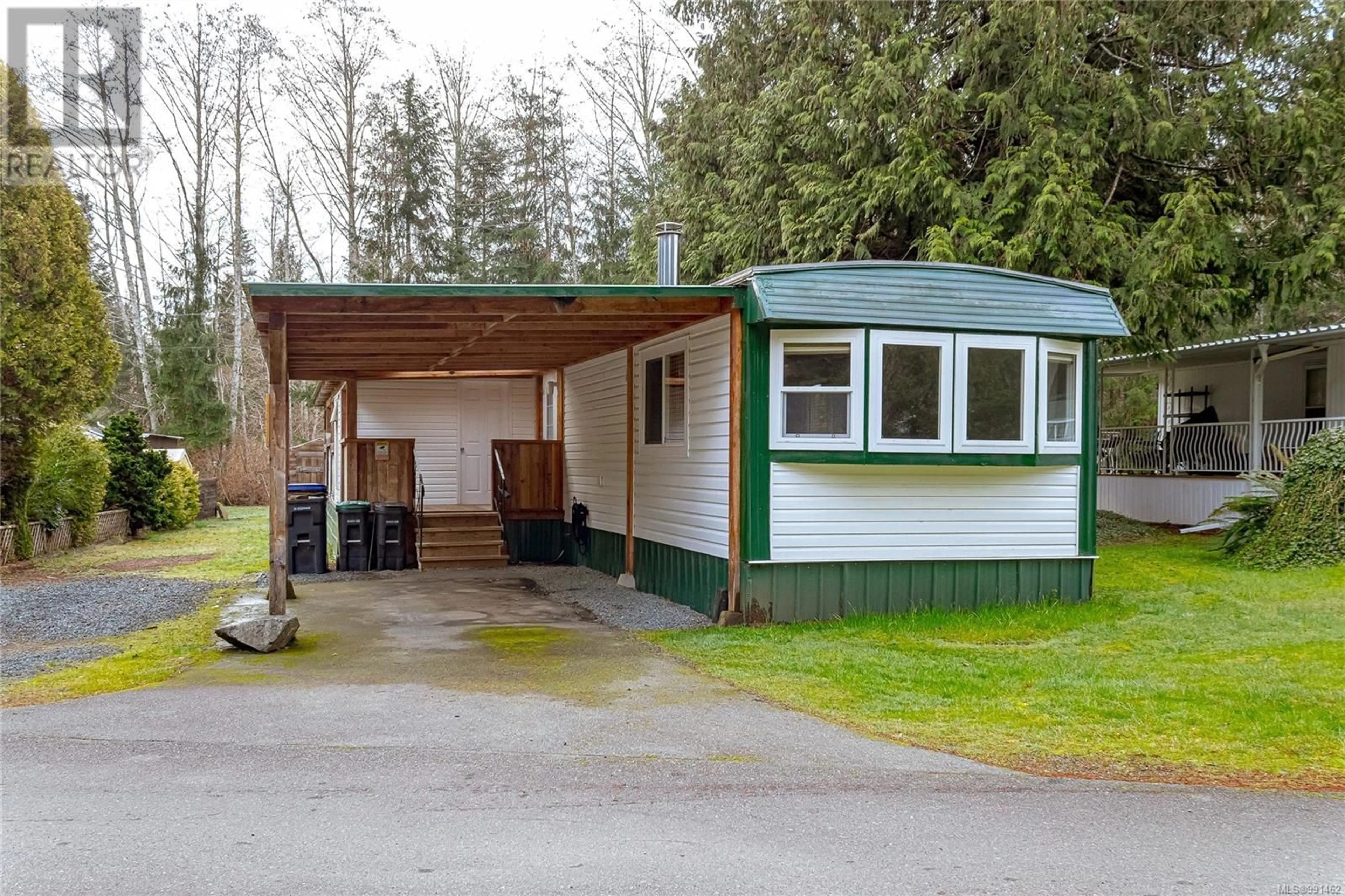 Home with vinyl exterior material, street for 2 6350 Island Hwy W, Qualicum Beach British Columbia V9K2E5