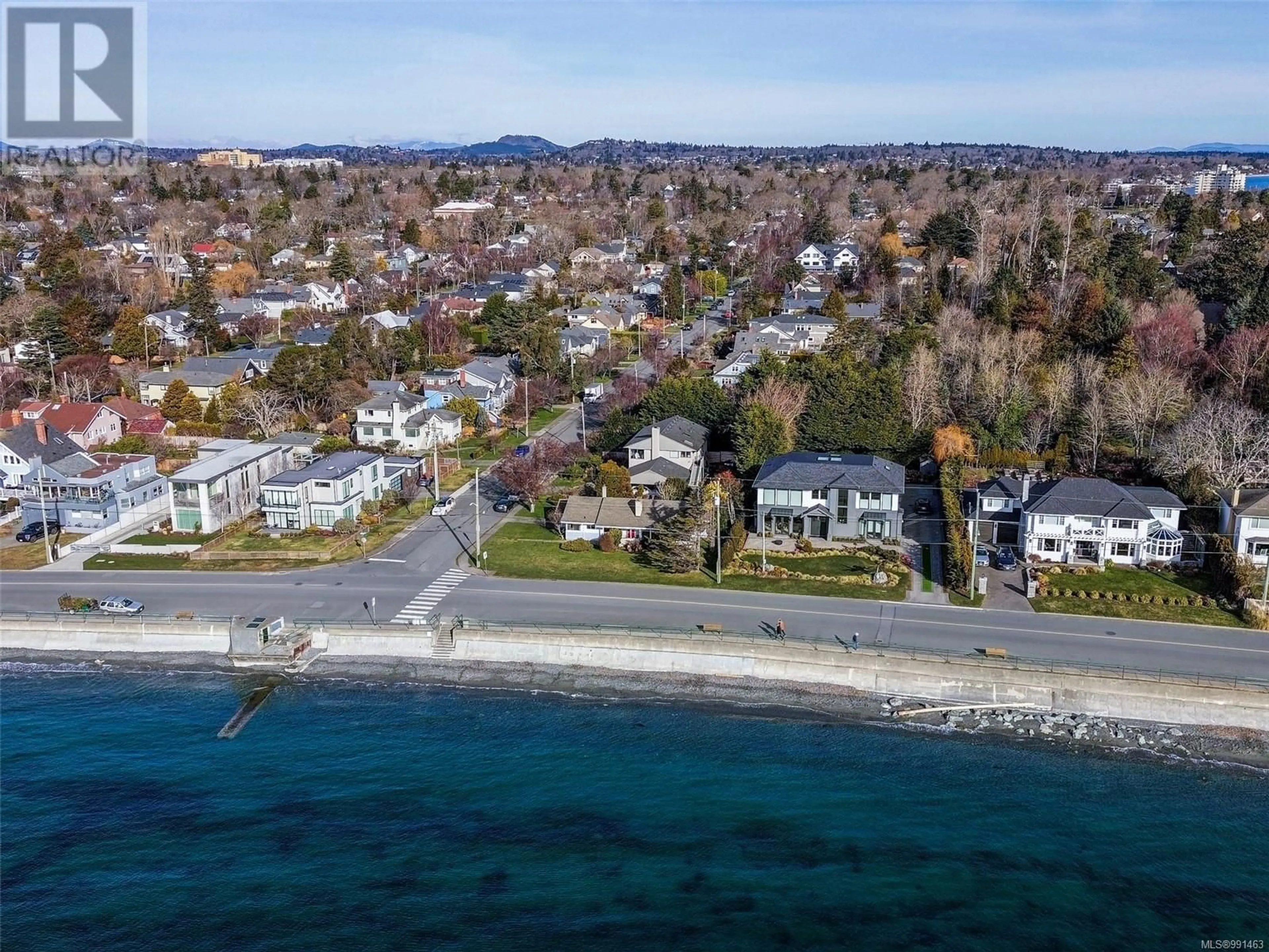 A pic from outside/outdoor area/front of a property/back of a property/a pic from drone, water/lake/river/ocean view for 406 Beach Dr, Oak Bay British Columbia V8S2M4