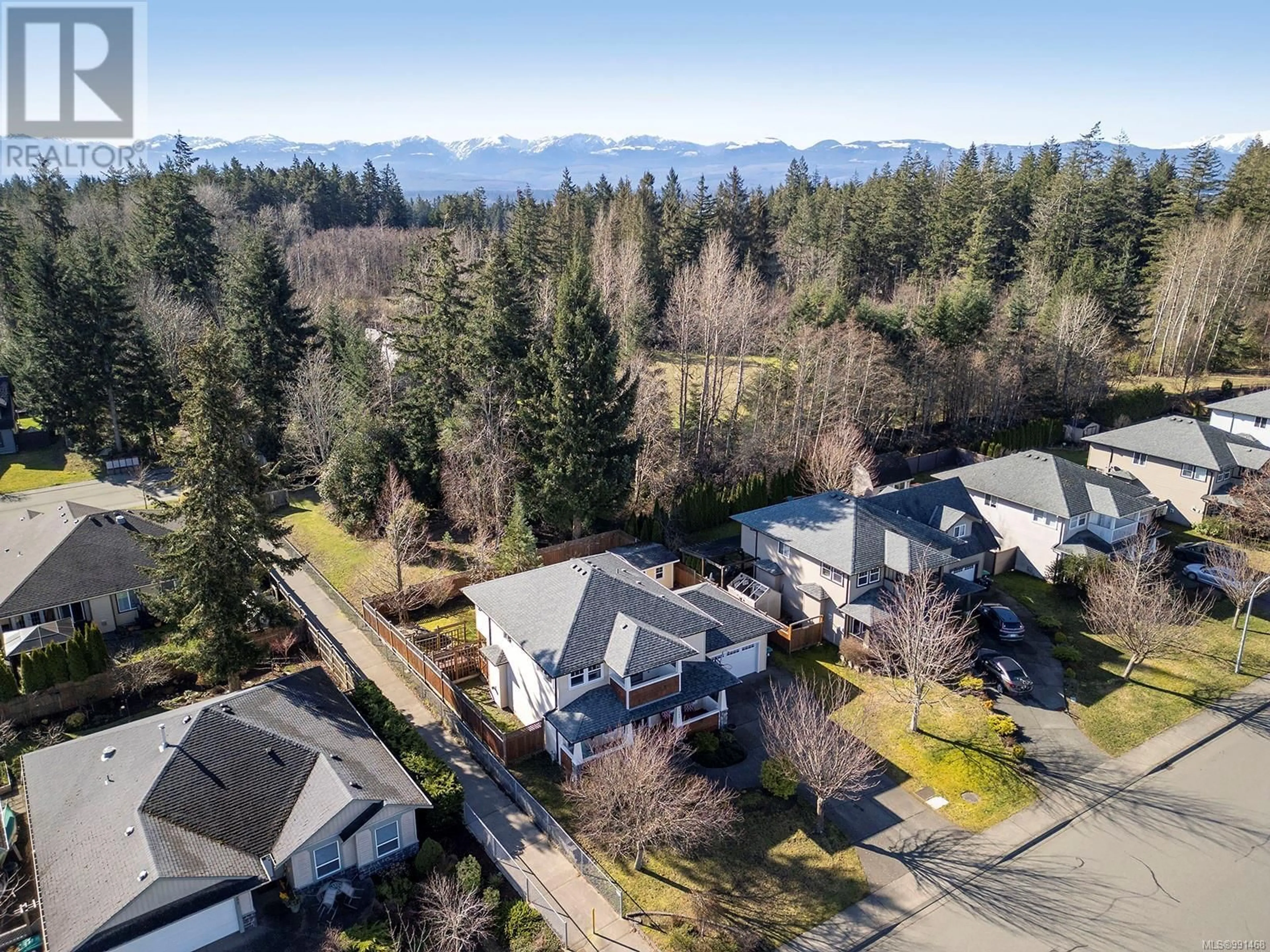 A pic from outside/outdoor area/front of a property/back of a property/a pic from drone, mountain view for 1309 Noel Ave, Comox British Columbia V9M3S7