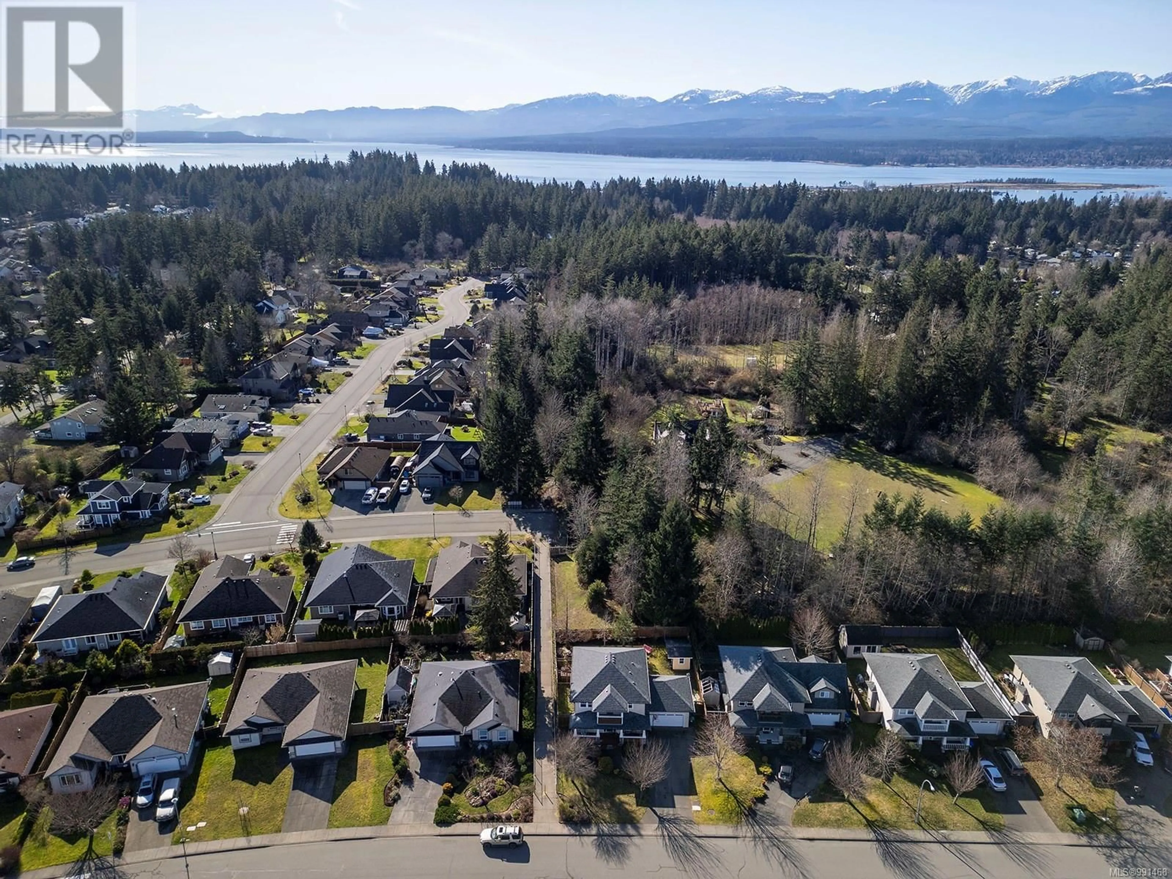 A pic from outside/outdoor area/front of a property/back of a property/a pic from drone, water/lake/river/ocean view for 1309 Noel Ave, Comox British Columbia V9M3S7