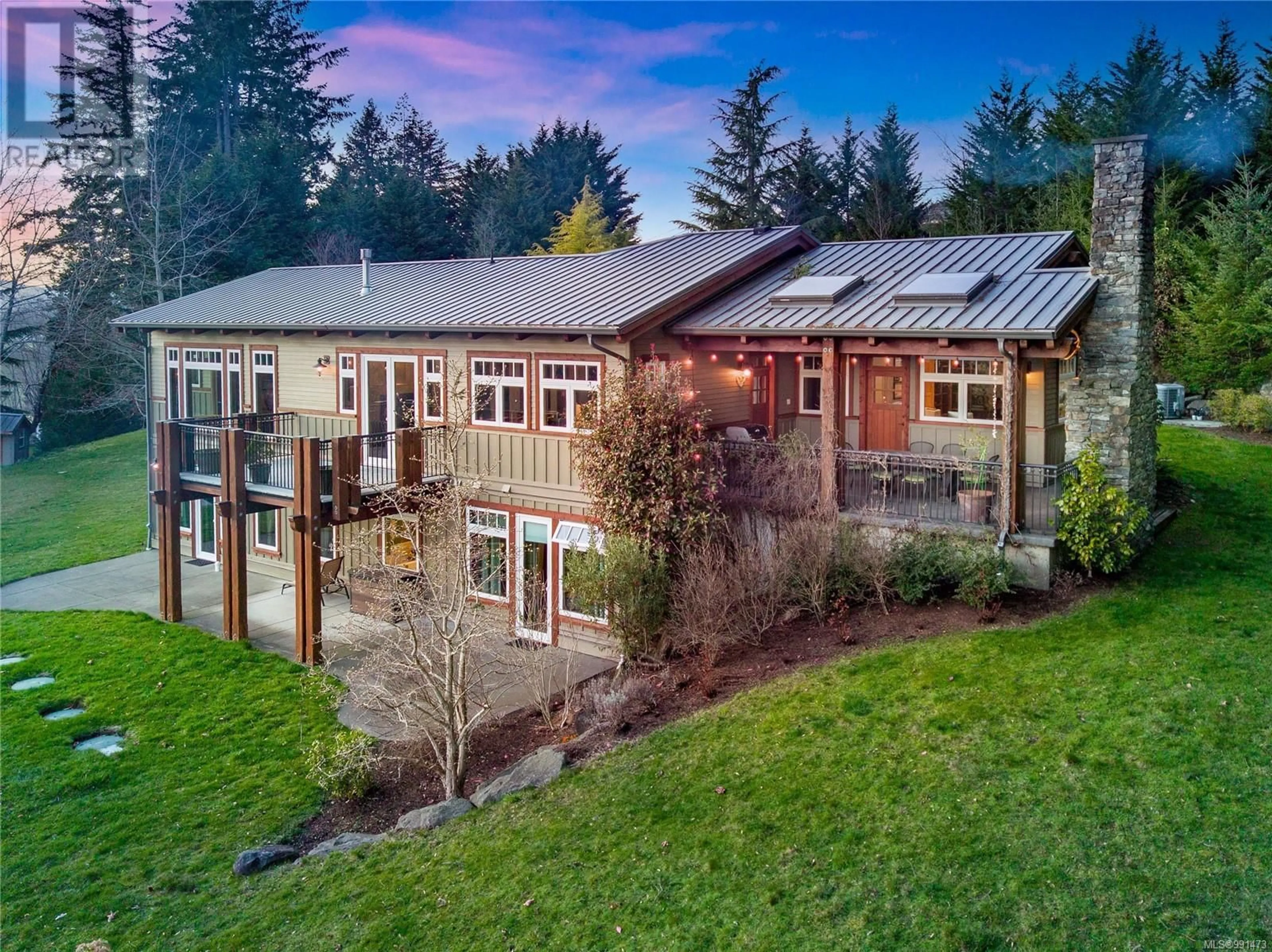 A pic from outside/outdoor area/front of a property/back of a property/a pic from drone, building for 2465 Back Rd, Courtenay British Columbia V9N9G8