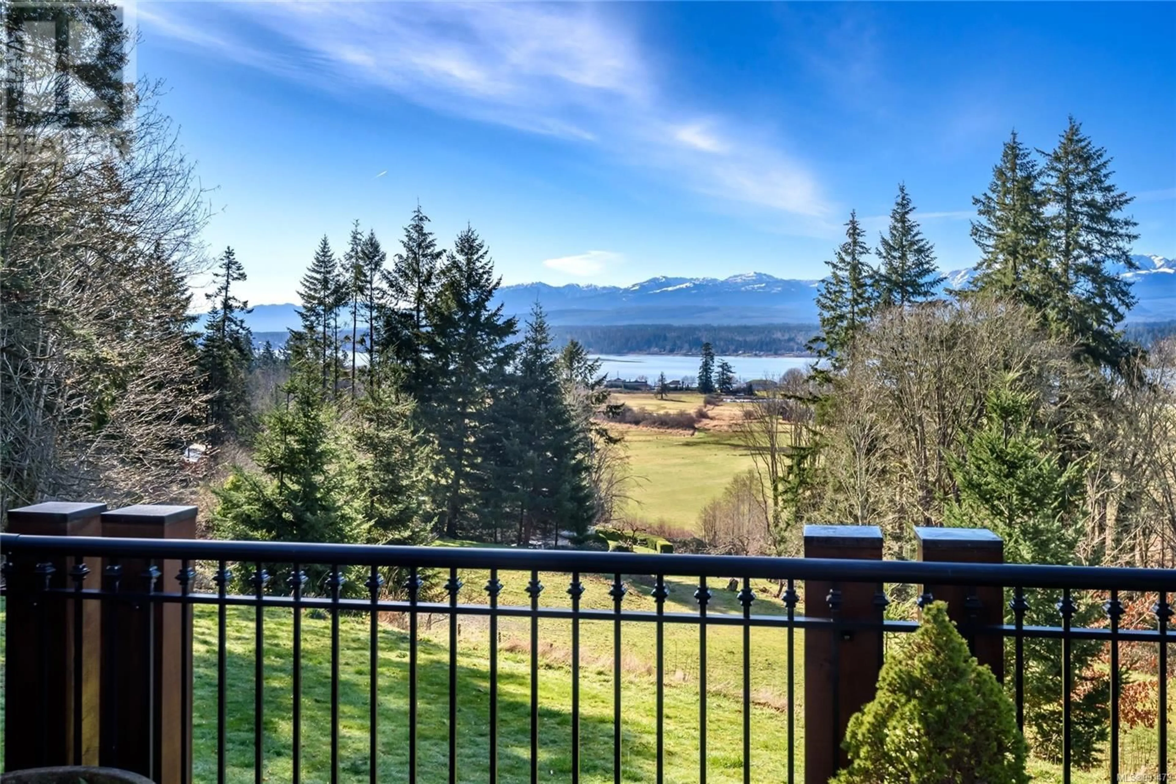 A pic from outside/outdoor area/front of a property/back of a property/a pic from drone, water/lake/river/ocean view for 2465 Back Rd, Courtenay British Columbia V9N9G8