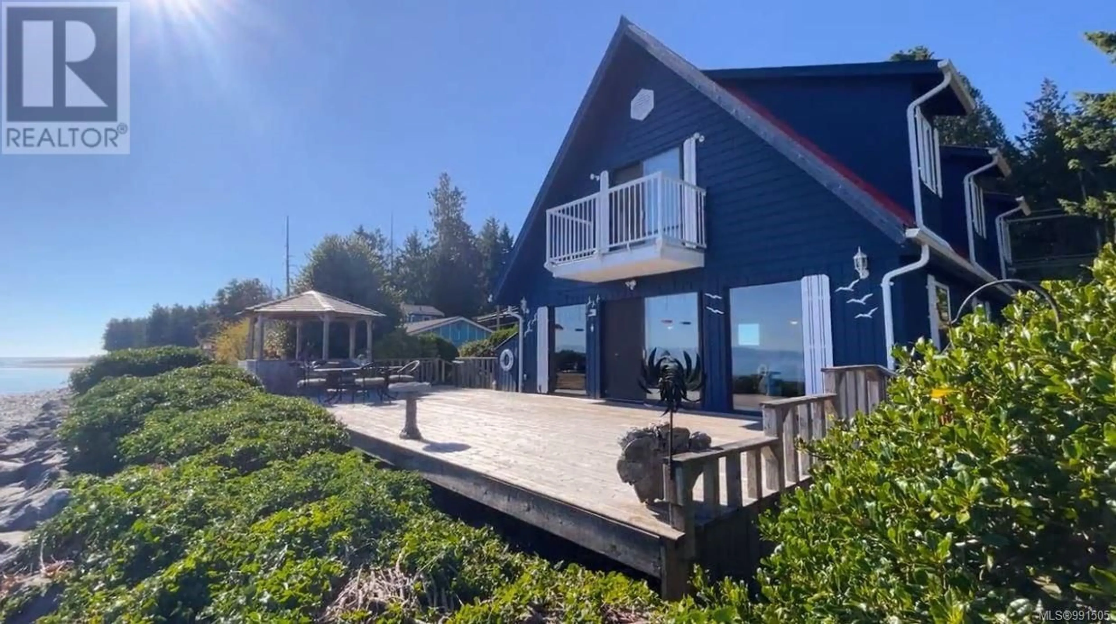 A pic from outside/outdoor area/front of a property/back of a property/a pic from drone, water/lake/river/ocean view for 5945 ISLAND HIGHWAY WEST, Qualicum Beach British Columbia V9K2C9