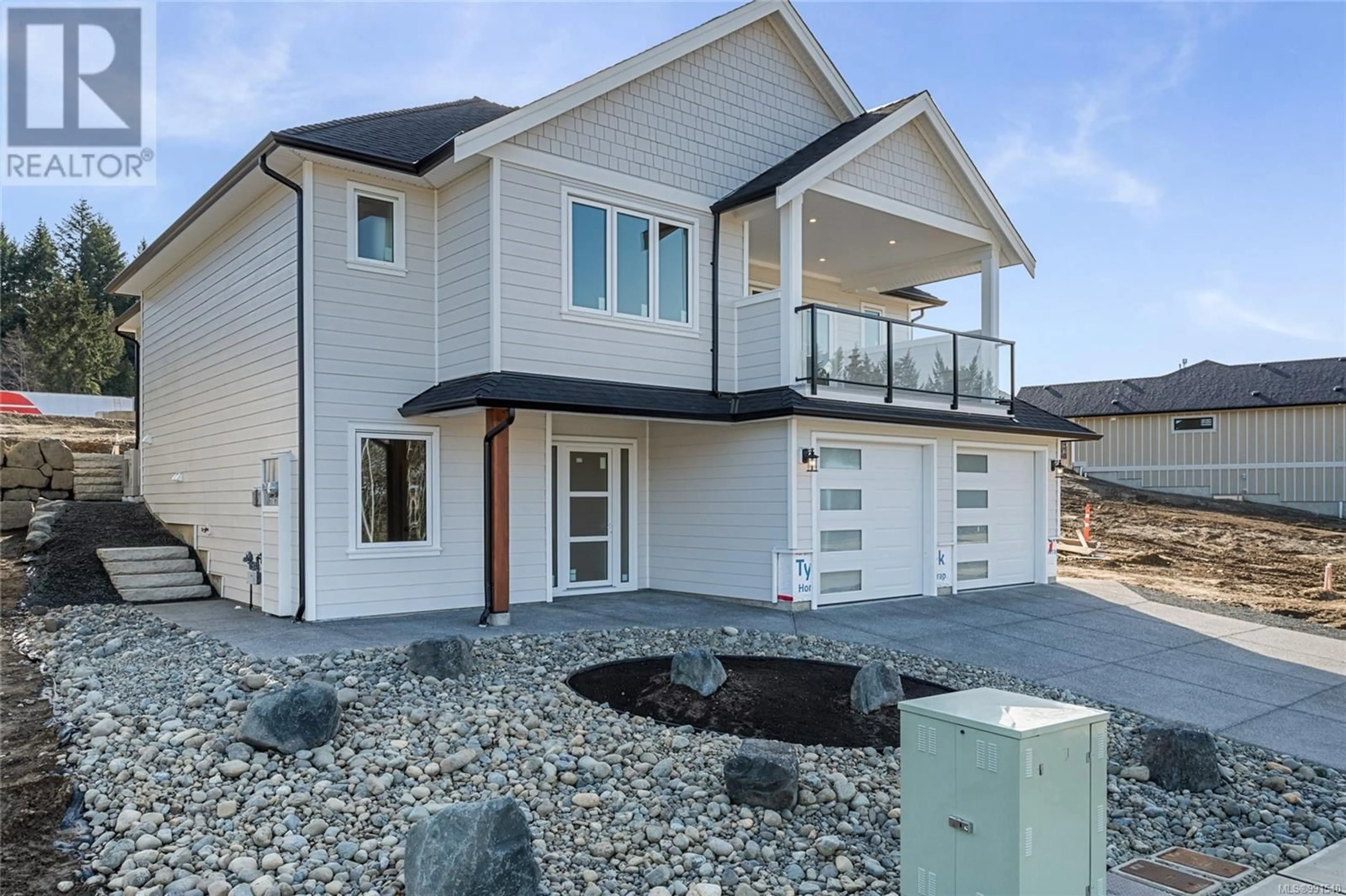 Home with vinyl exterior material, street for 1783 CROWN ISLE BOULEVARD, Courtenay British Columbia V9N0K1