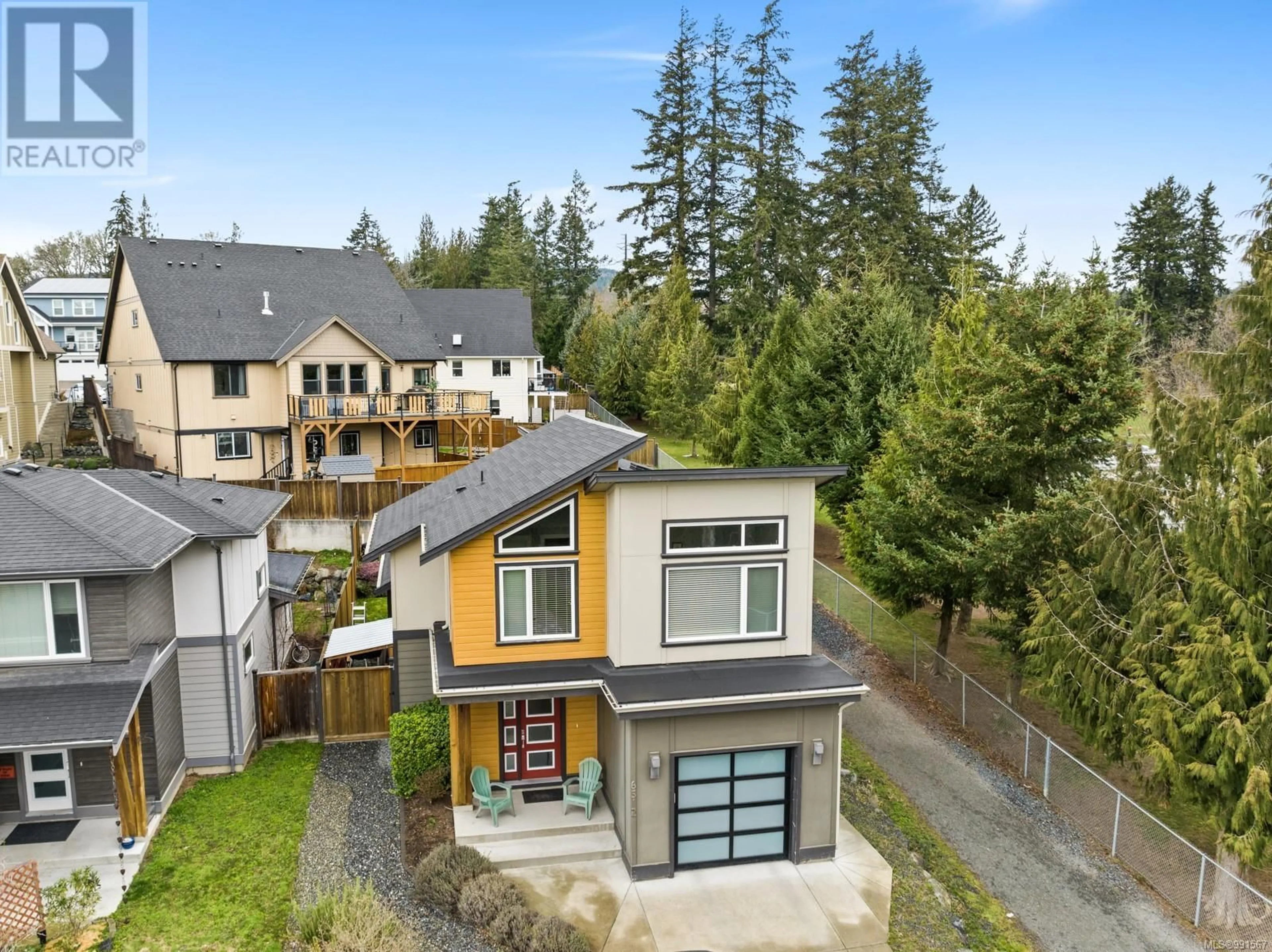 A pic from outside/outdoor area/front of a property/back of a property/a pic from drone, mountain view for 6512 Arranwood Dr, Sooke British Columbia V9Z0W4