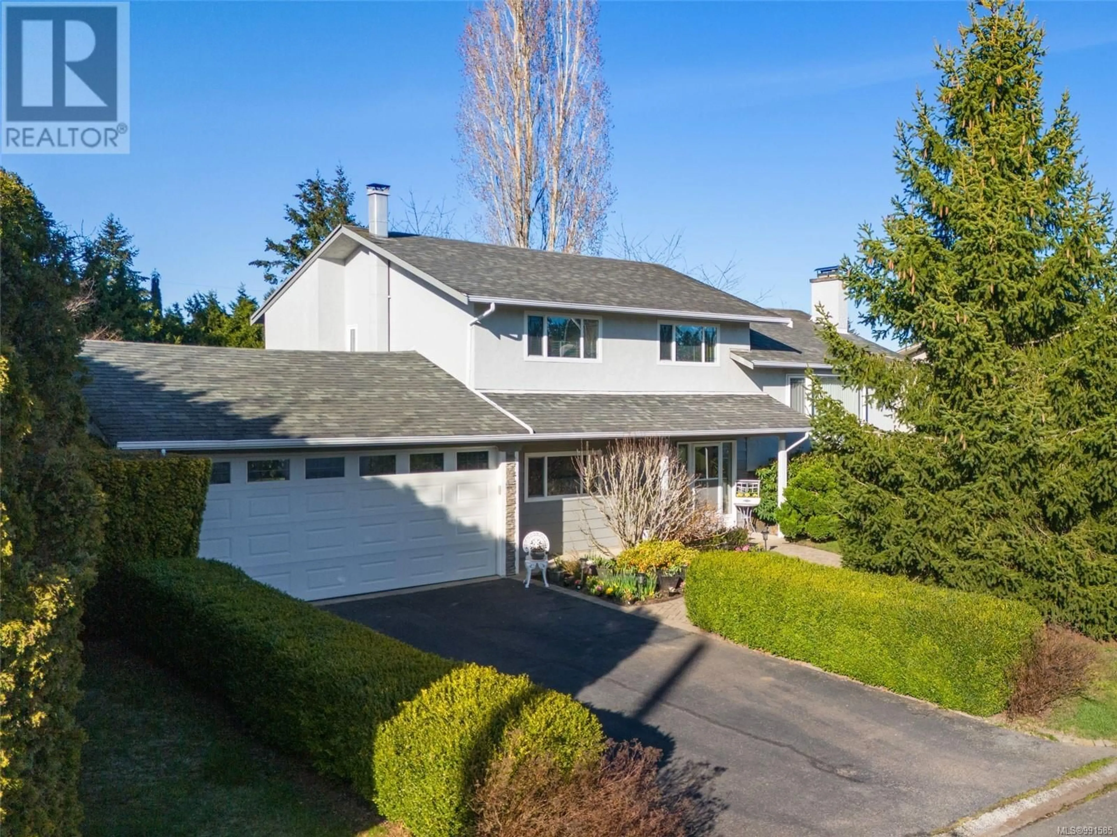 A pic from outside/outdoor area/front of a property/back of a property/a pic from drone, street for 2012 Skyline Cres, Central Saanich British Columbia V8M1M6