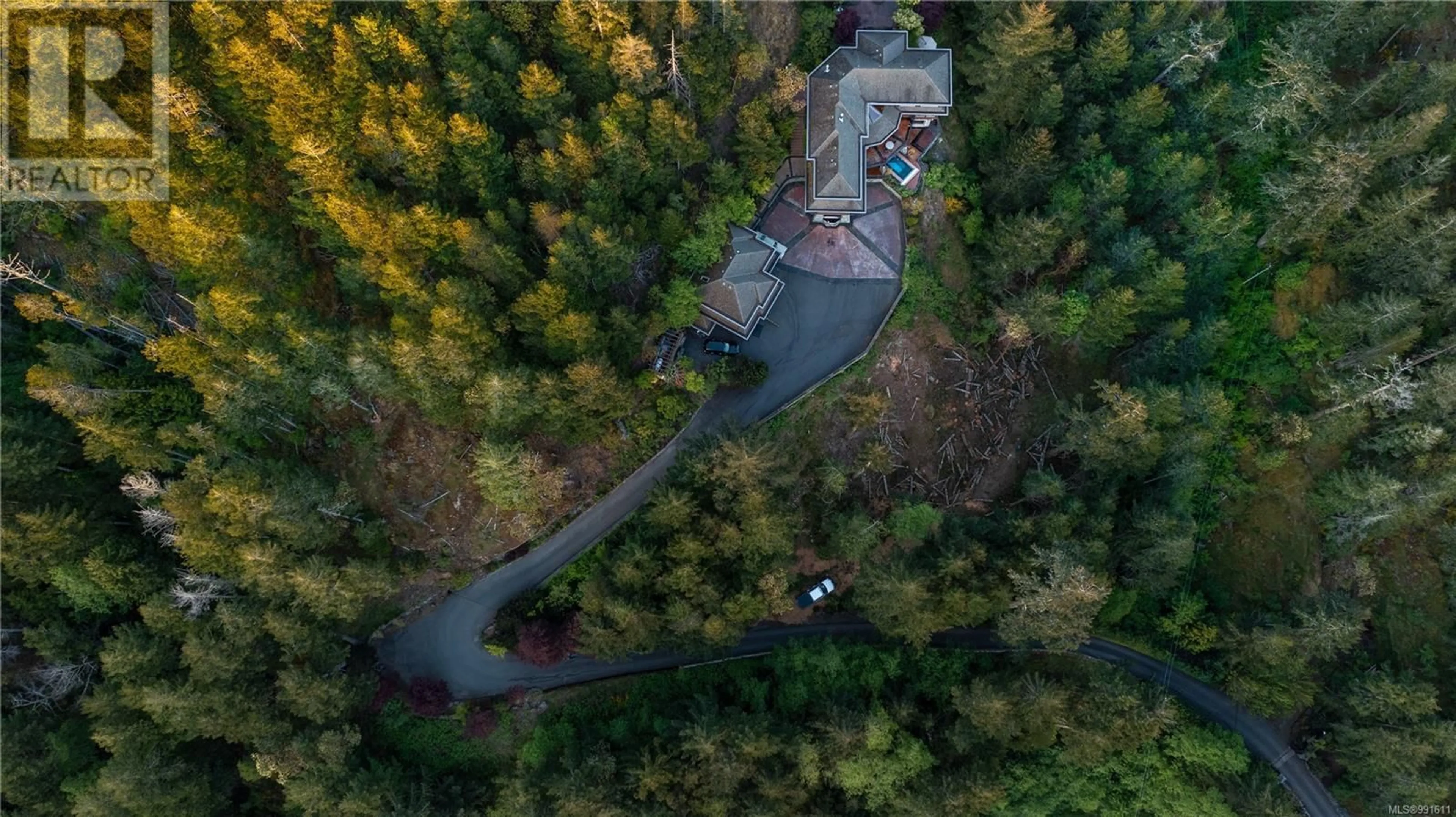 A pic from outside/outdoor area/front of a property/back of a property/a pic from drone, forest/trees view for 4948 NAGLE ROAD, Sooke British Columbia V9Z1C7