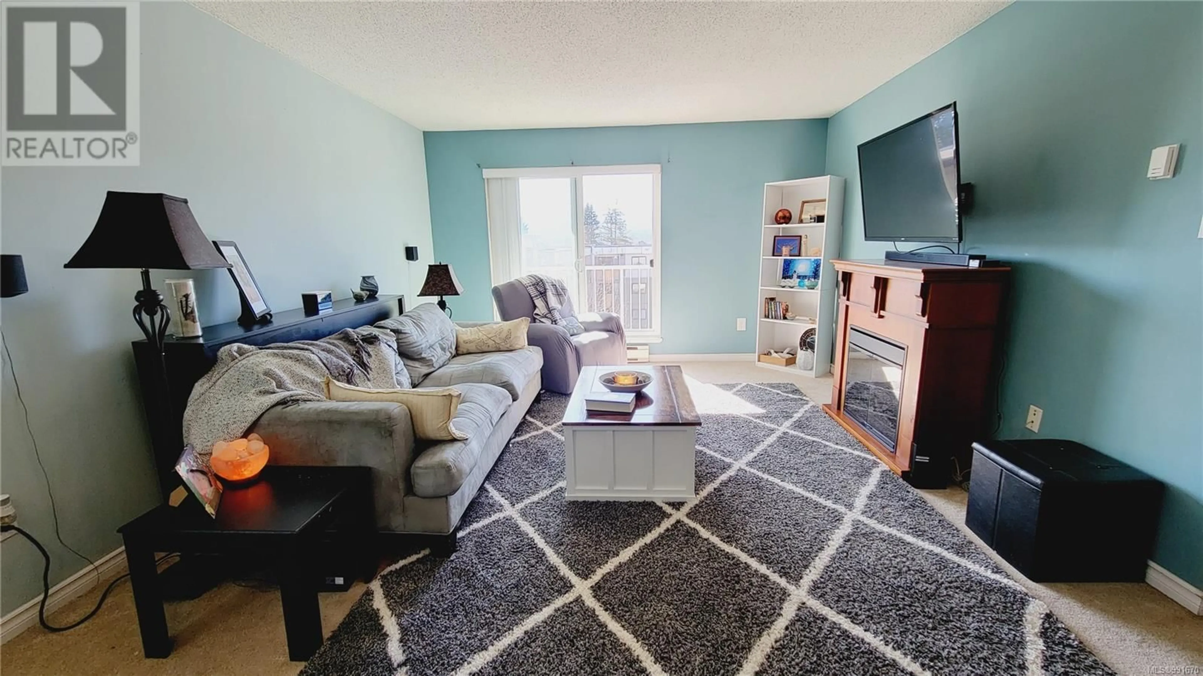 Living room with furniture, unknown for 401 175 Centennial Dr, Courtenay British Columbia V9N7M4