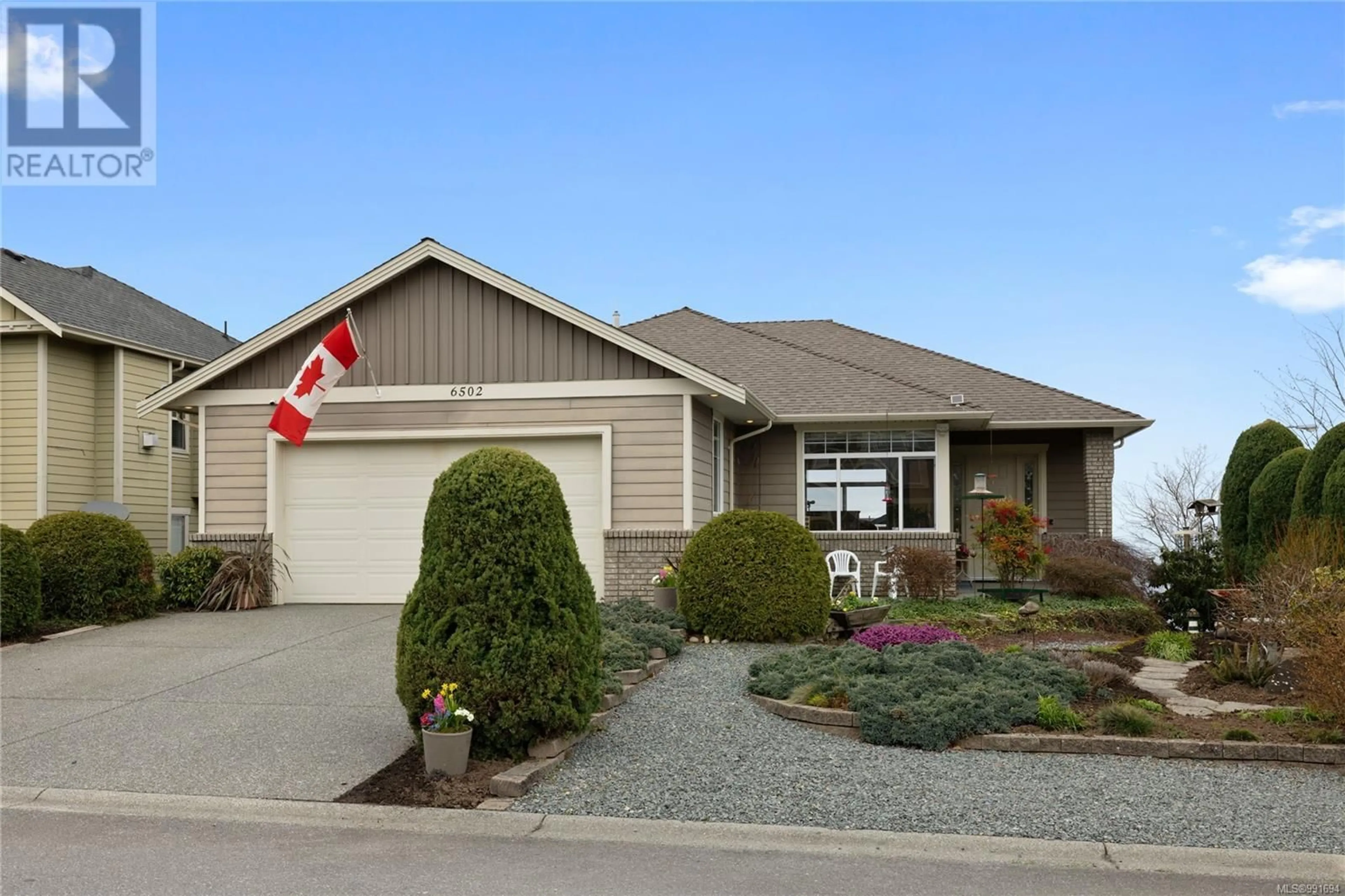 Home with vinyl exterior material, street for 6502 GERKE PLACE, Nanaimo British Columbia V9V1V8