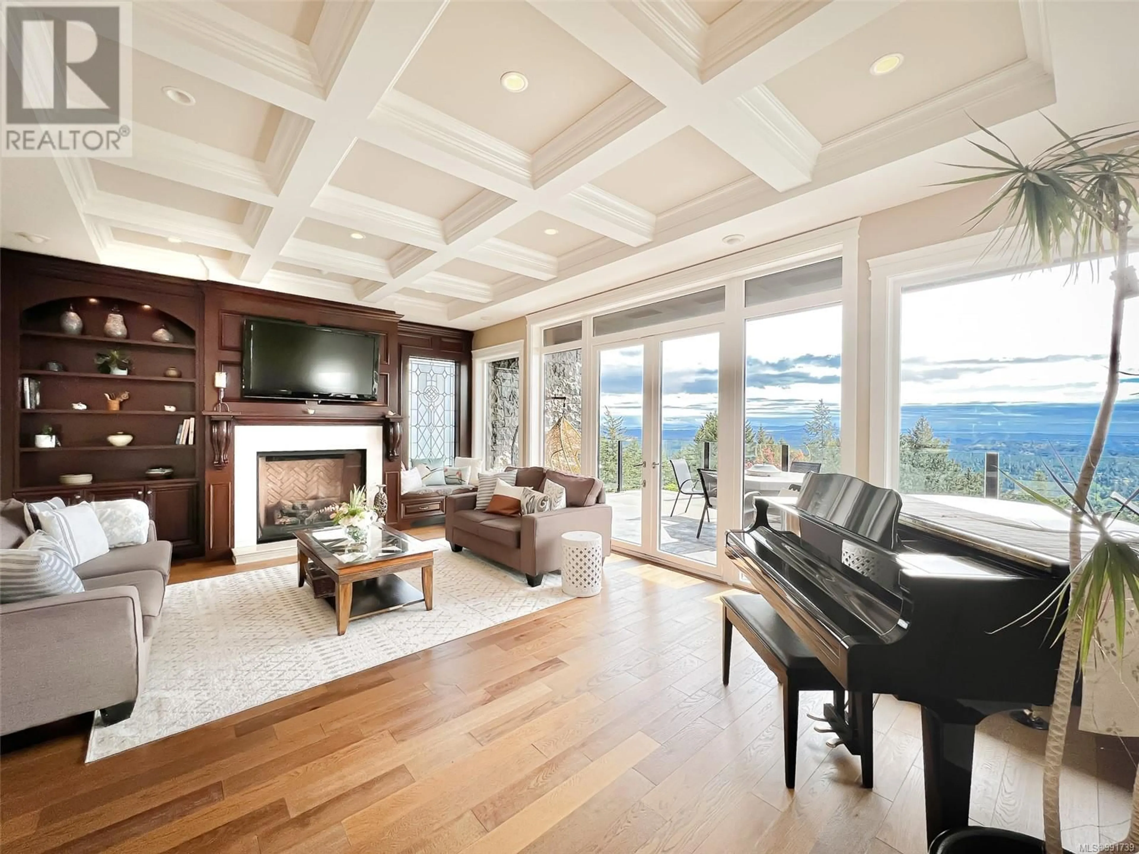 Living room with furniture, wood/laminate floor for 2179 Spirit Ridge Dr, Langford British Columbia V9B0B5