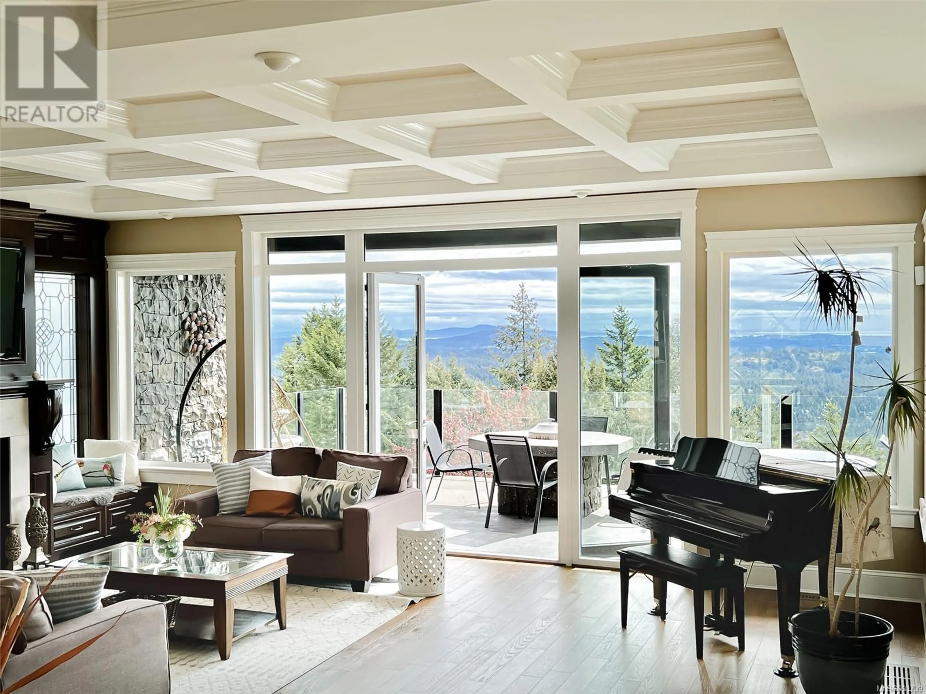 Living room with furniture, ceramic/tile floor for 2179 Spirit Ridge Dr, Langford British Columbia V9B0B5