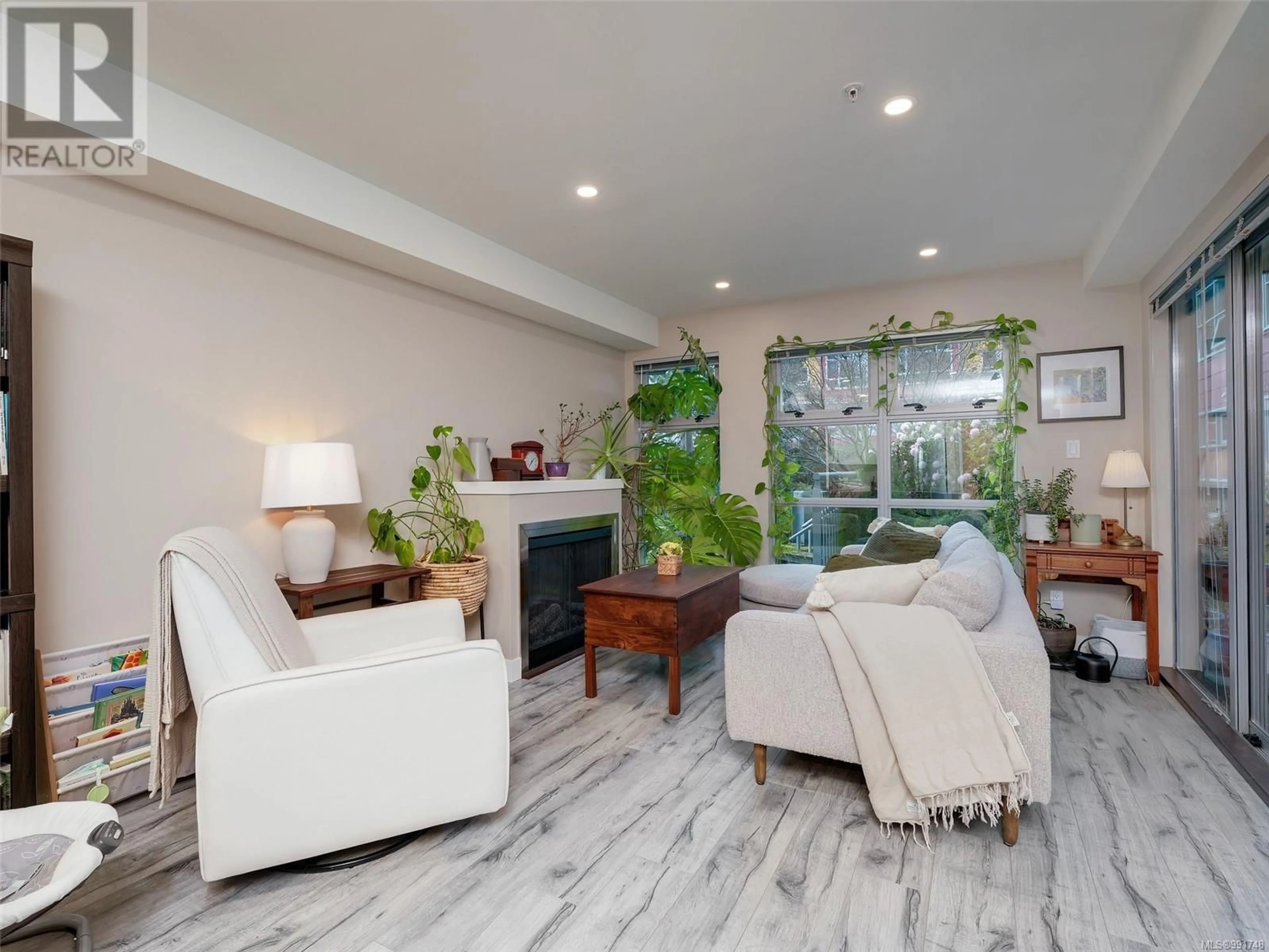 Living room with furniture, unknown for 108 797 Tyee Rd, Victoria British Columbia V9A7R4