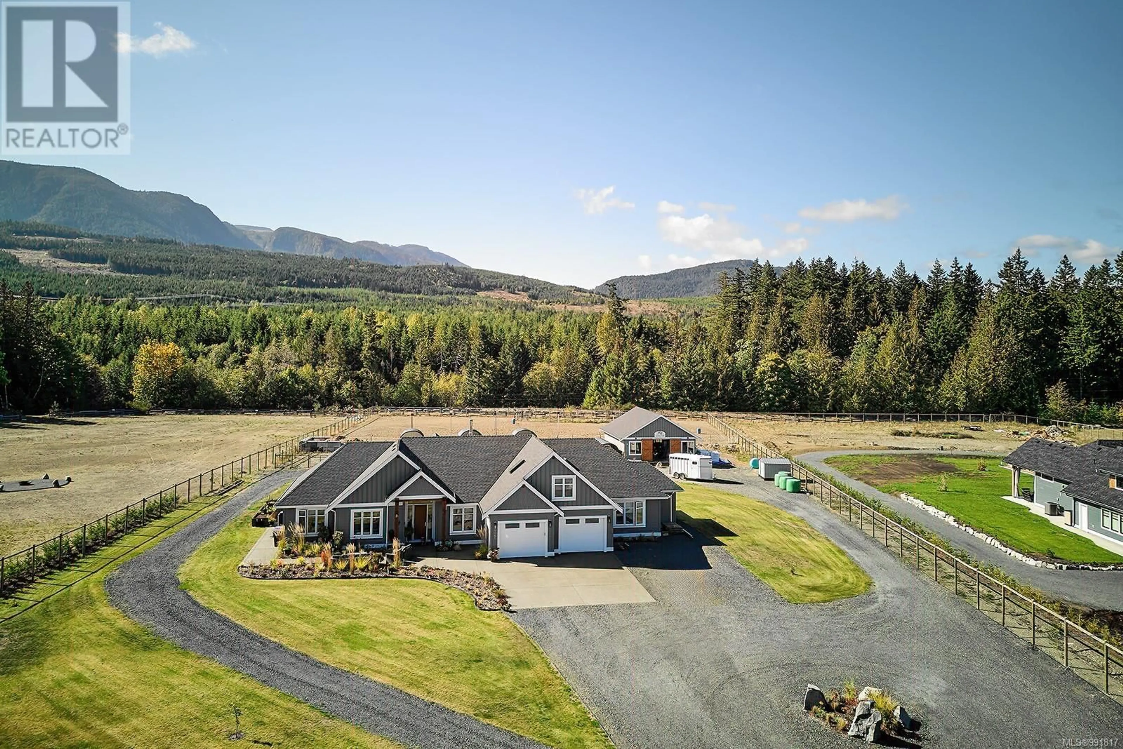 A pic from outside/outdoor area/front of a property/back of a property/a pic from drone, mountain view for 1085 Alpine View Pl, Whiskey Creek British Columbia V9K1V6