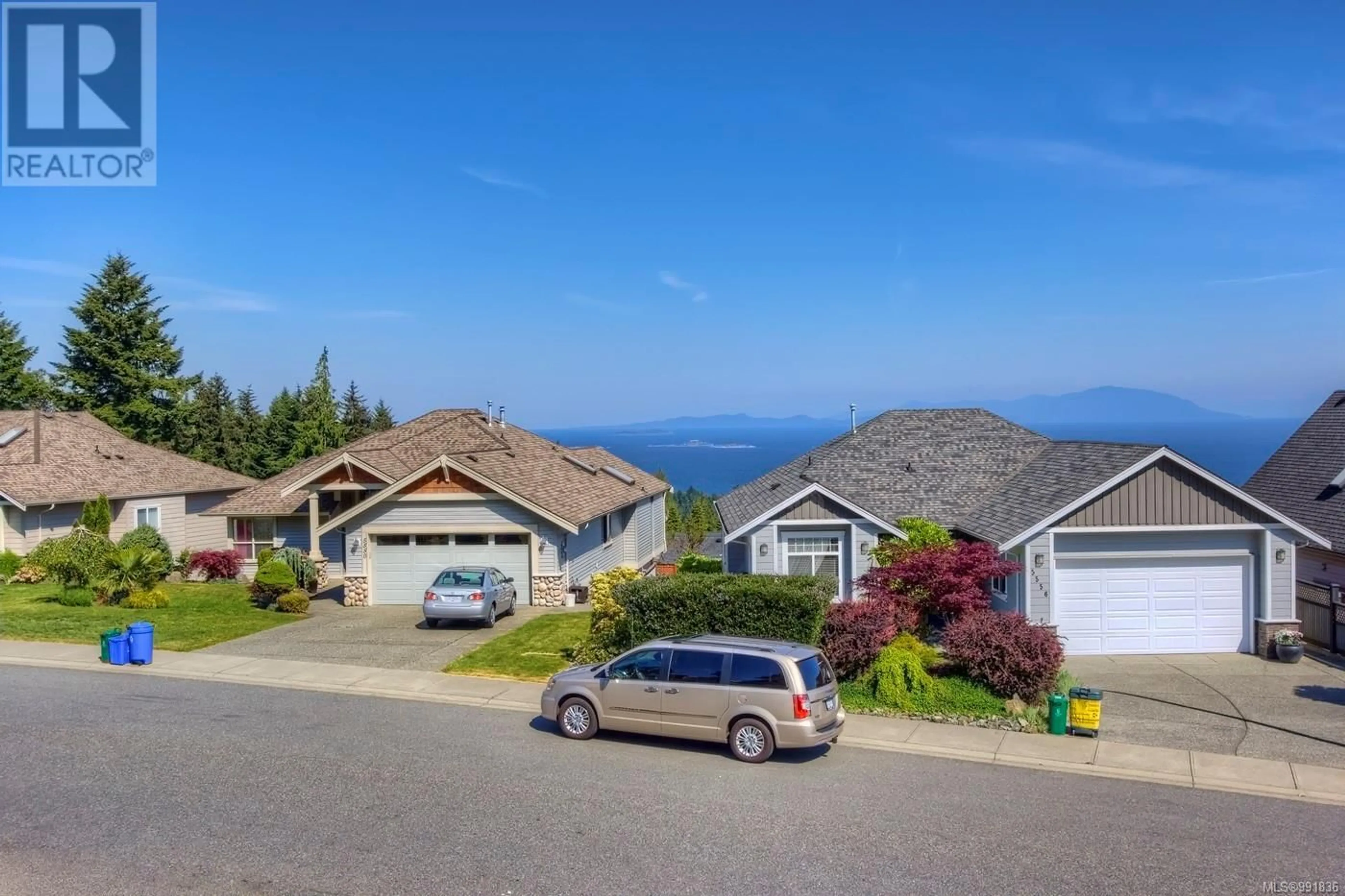 A pic from outside/outdoor area/front of a property/back of a property/a pic from drone, unknown for 5555 Cliffside Rd, Nanaimo British Columbia V9T6R3