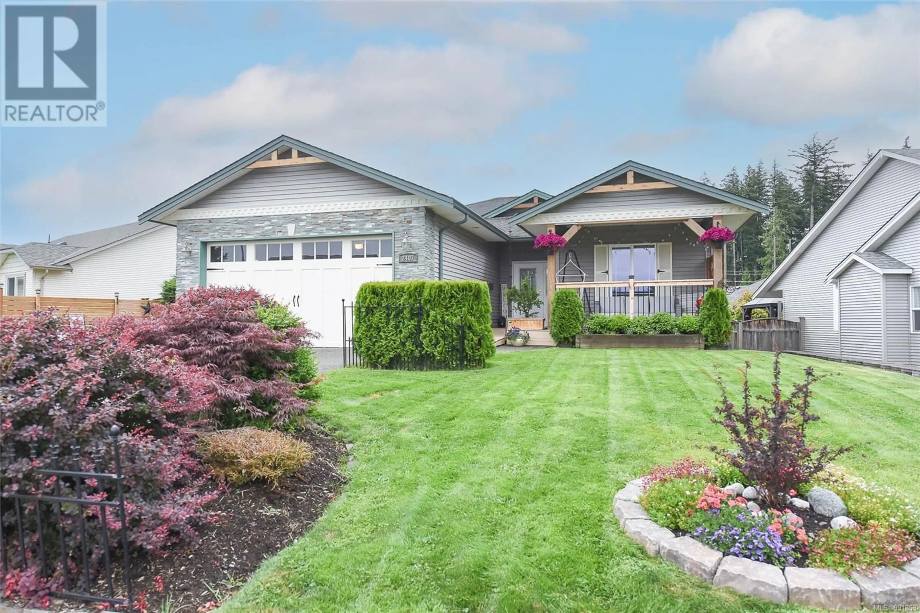 Home with vinyl exterior material, street for 2407 INVERCLYDE WAY, Courtenay British Columbia V9N1G5