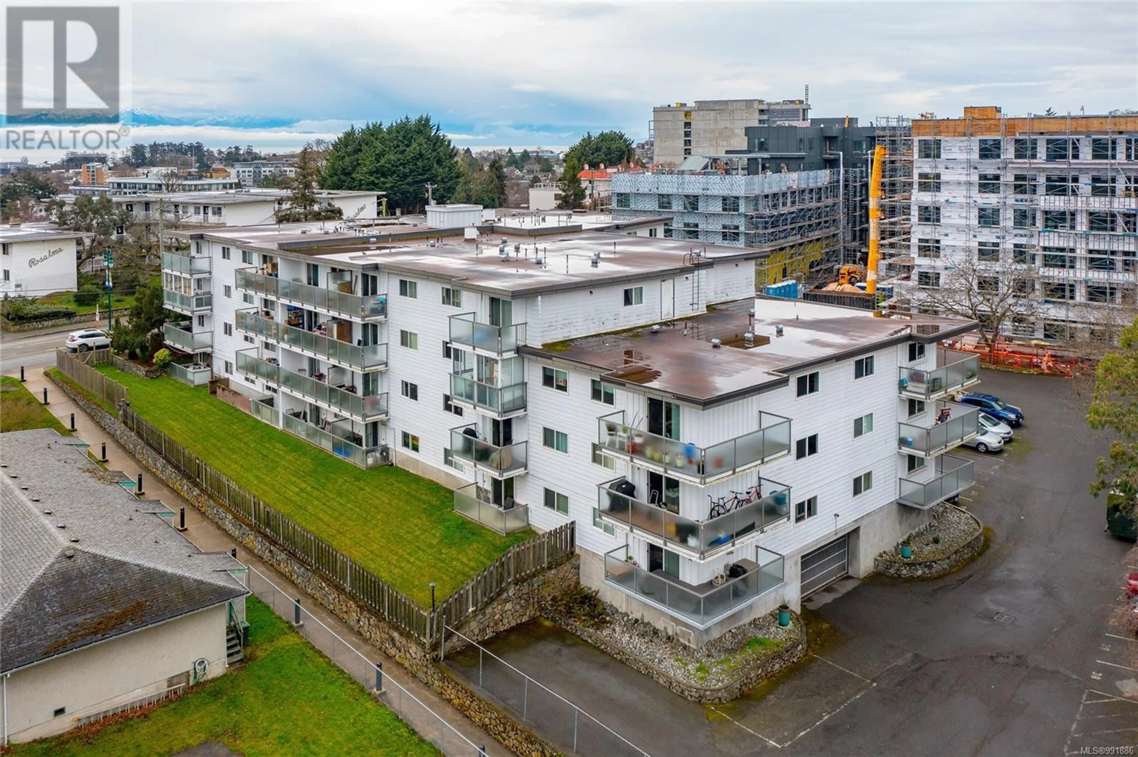 A pic from outside/outdoor area/front of a property/back of a property/a pic from drone, city buildings view from balcony for 205 848 Esquimalt Rd, Esquimalt British Columbia V9A6W9