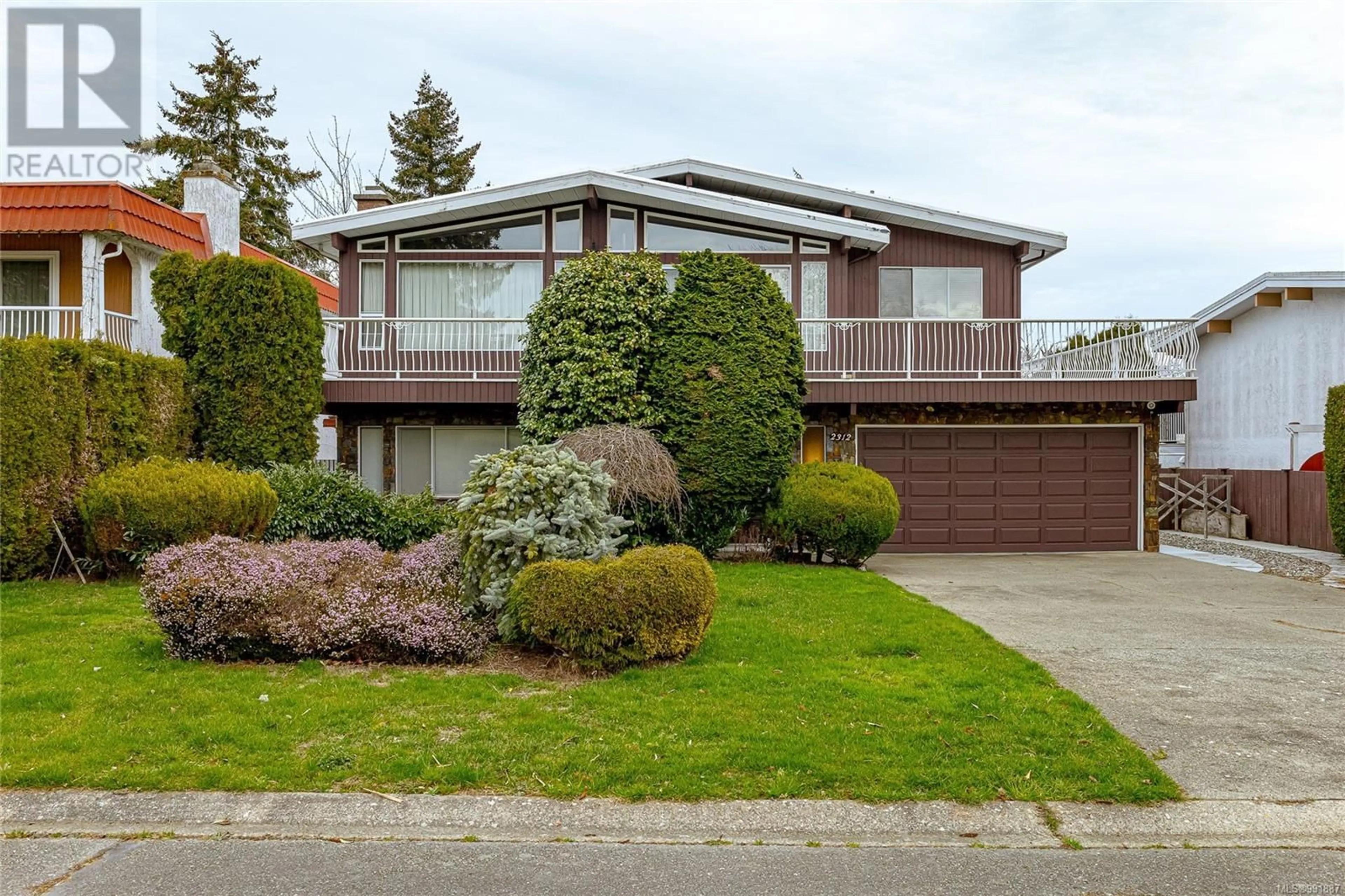 Home with vinyl exterior material, street for 2312 Foxington Pl, Saanich British Columbia V8N5K2