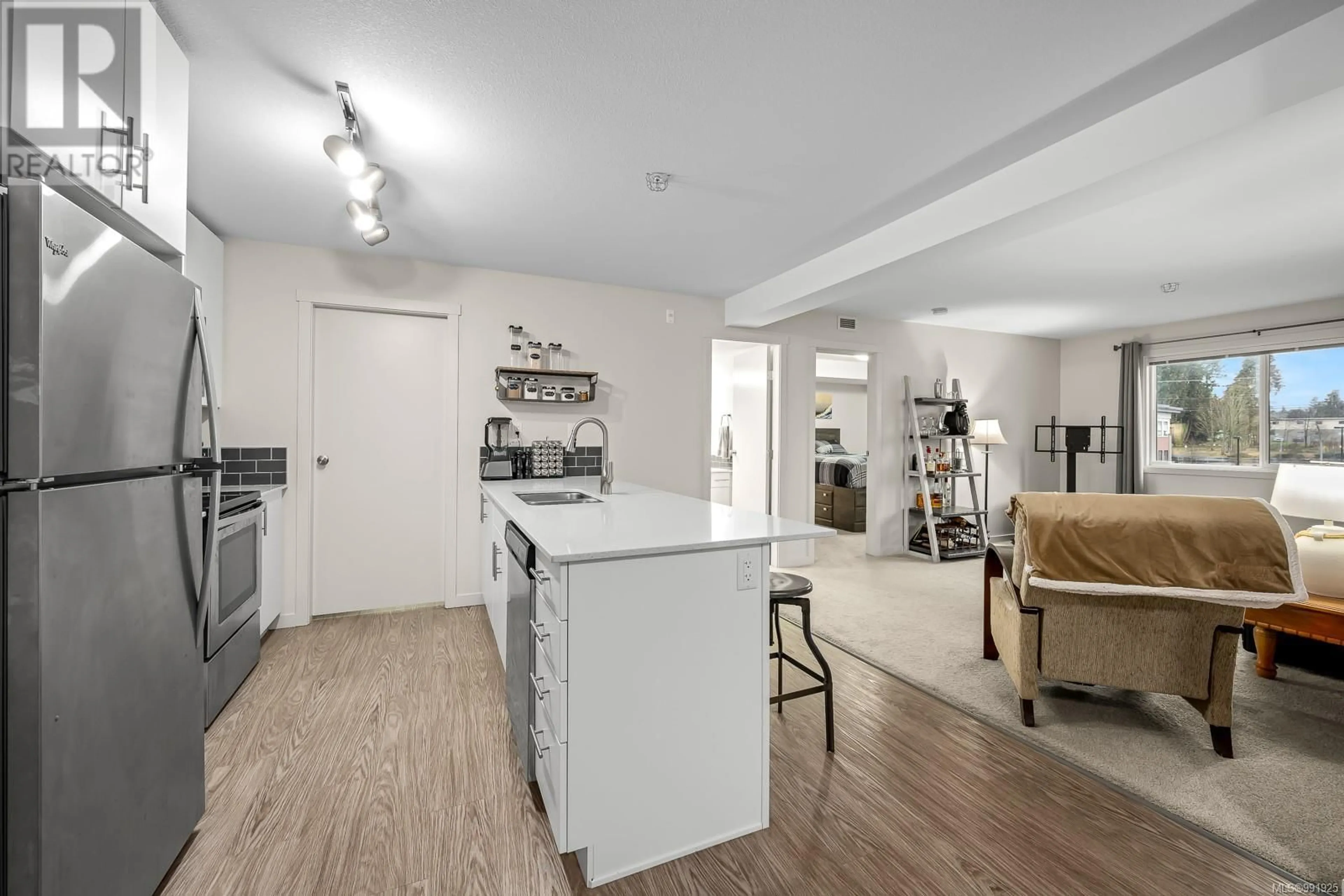 Open concept kitchen, unknown for 303 - 1944 RIVERSIDE LANE, Courtenay British Columbia V9N0E5