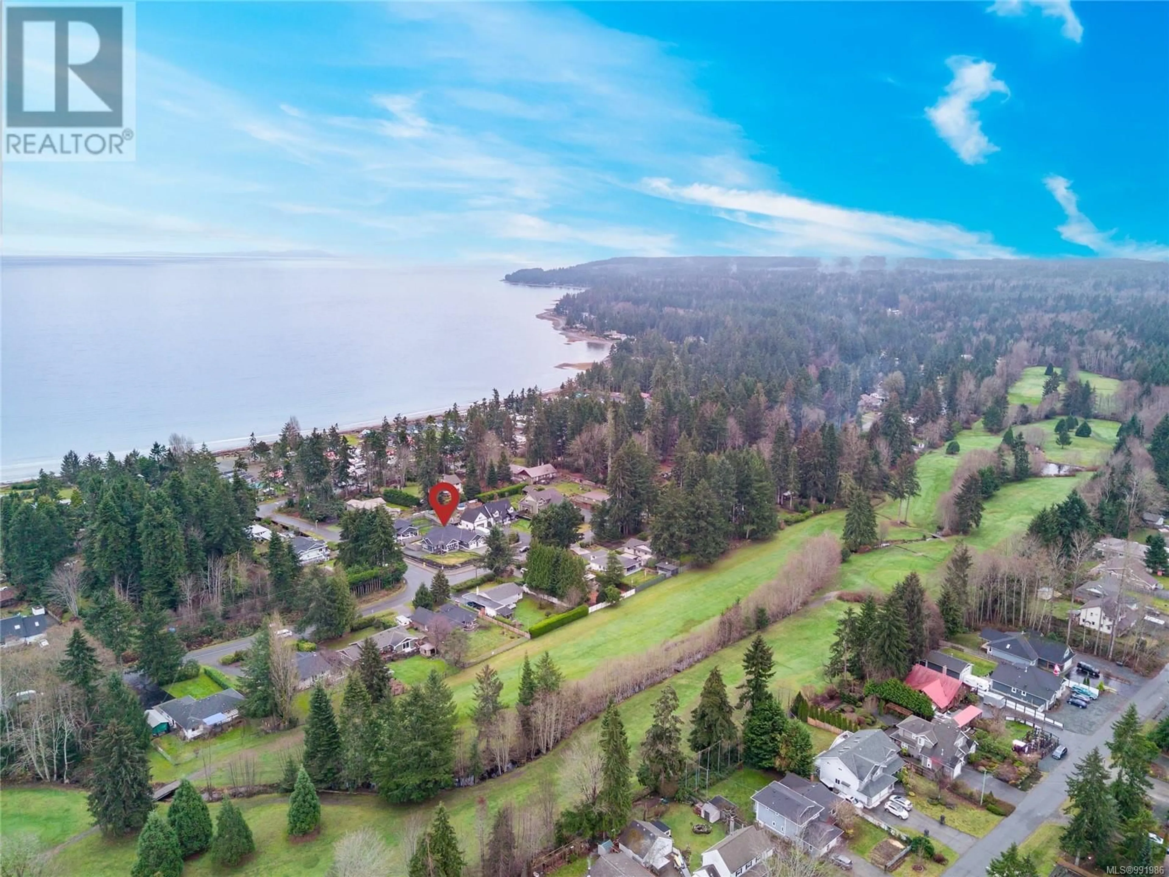 A pic from outside/outdoor area/front of a property/back of a property/a pic from drone, water/lake/river/ocean view for 8968 HENDERSON AVENUE, Black Creek British Columbia V9J1A4