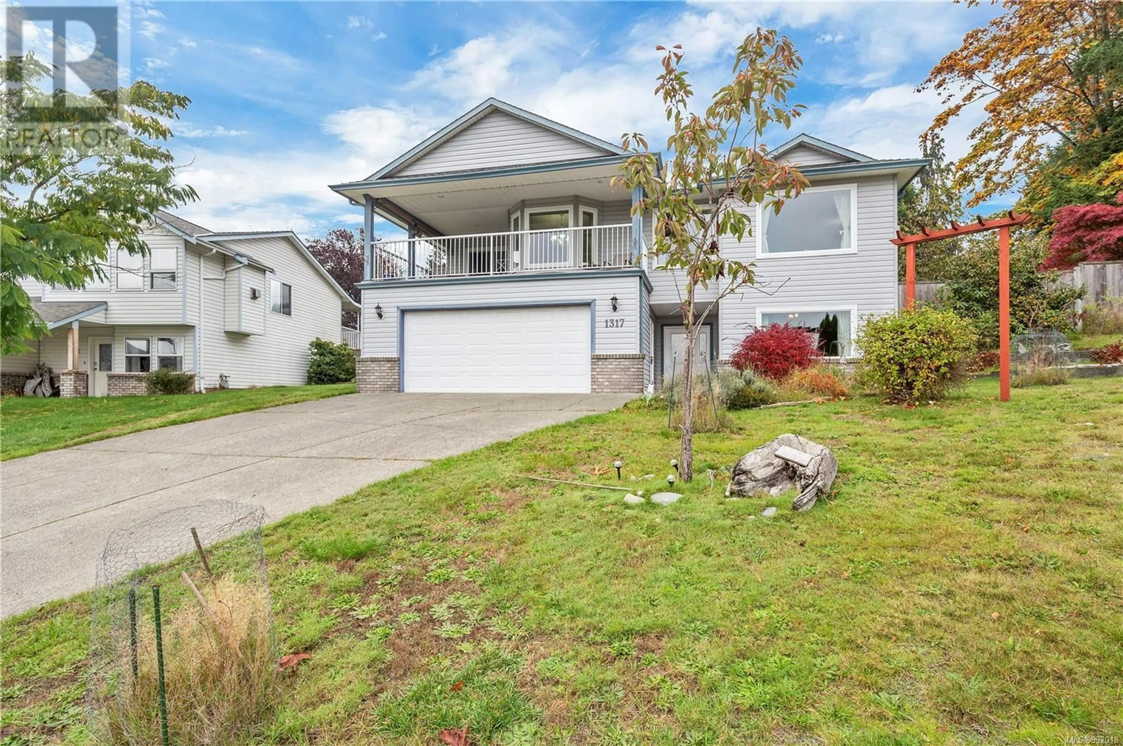 Home with vinyl exterior material, street for 1317 CARAMEL CRESCENT, Campbell River British Columbia V9W7Y8