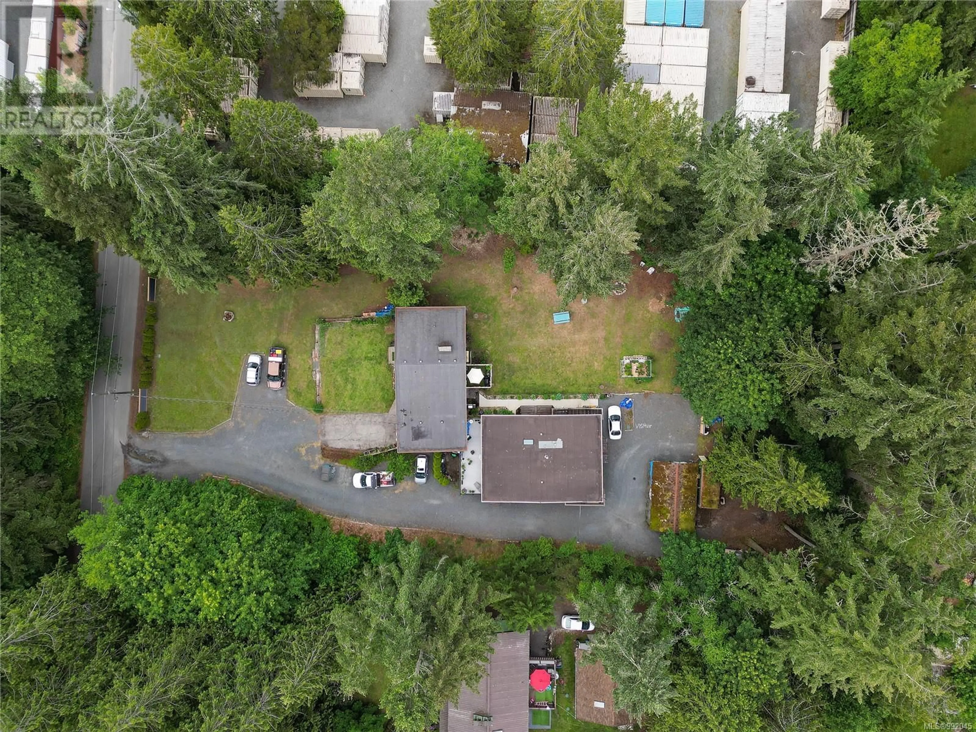 A pic from outside/outdoor area/front of a property/back of a property/a pic from drone, forest/trees view for IDLEMORE ROAD, Sooke British Columbia V9Z0A9