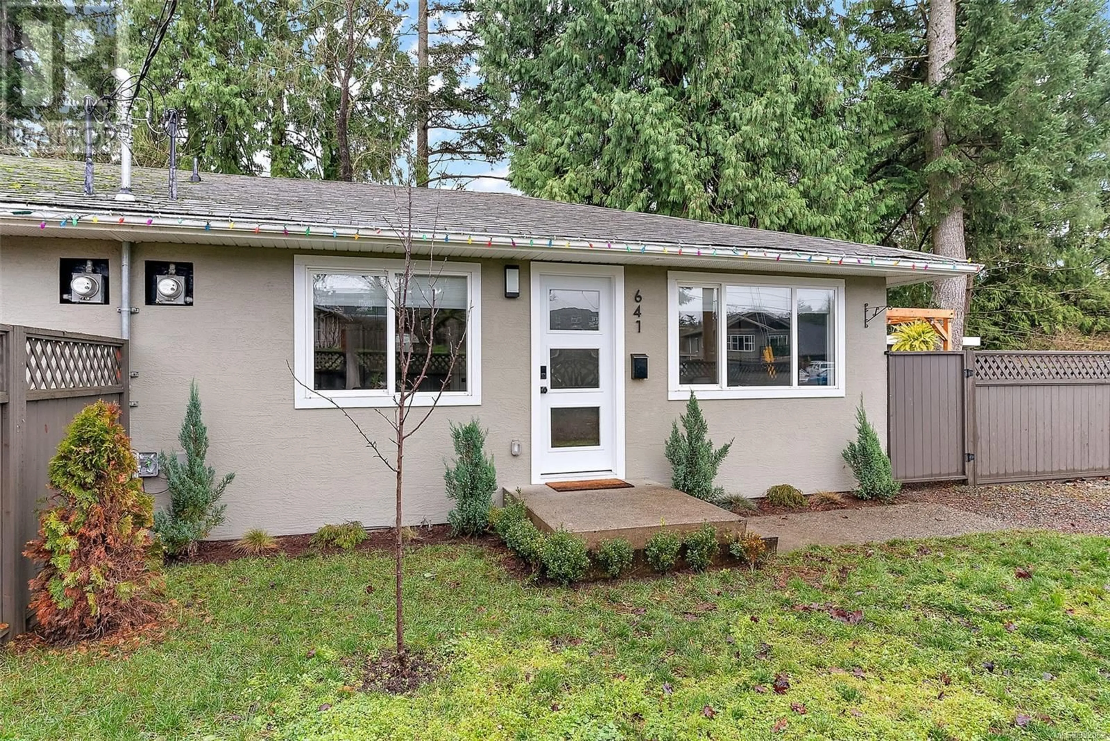 Home with vinyl exterior material, street for 641 Strandlund Ave, Langford British Columbia V9B3G1