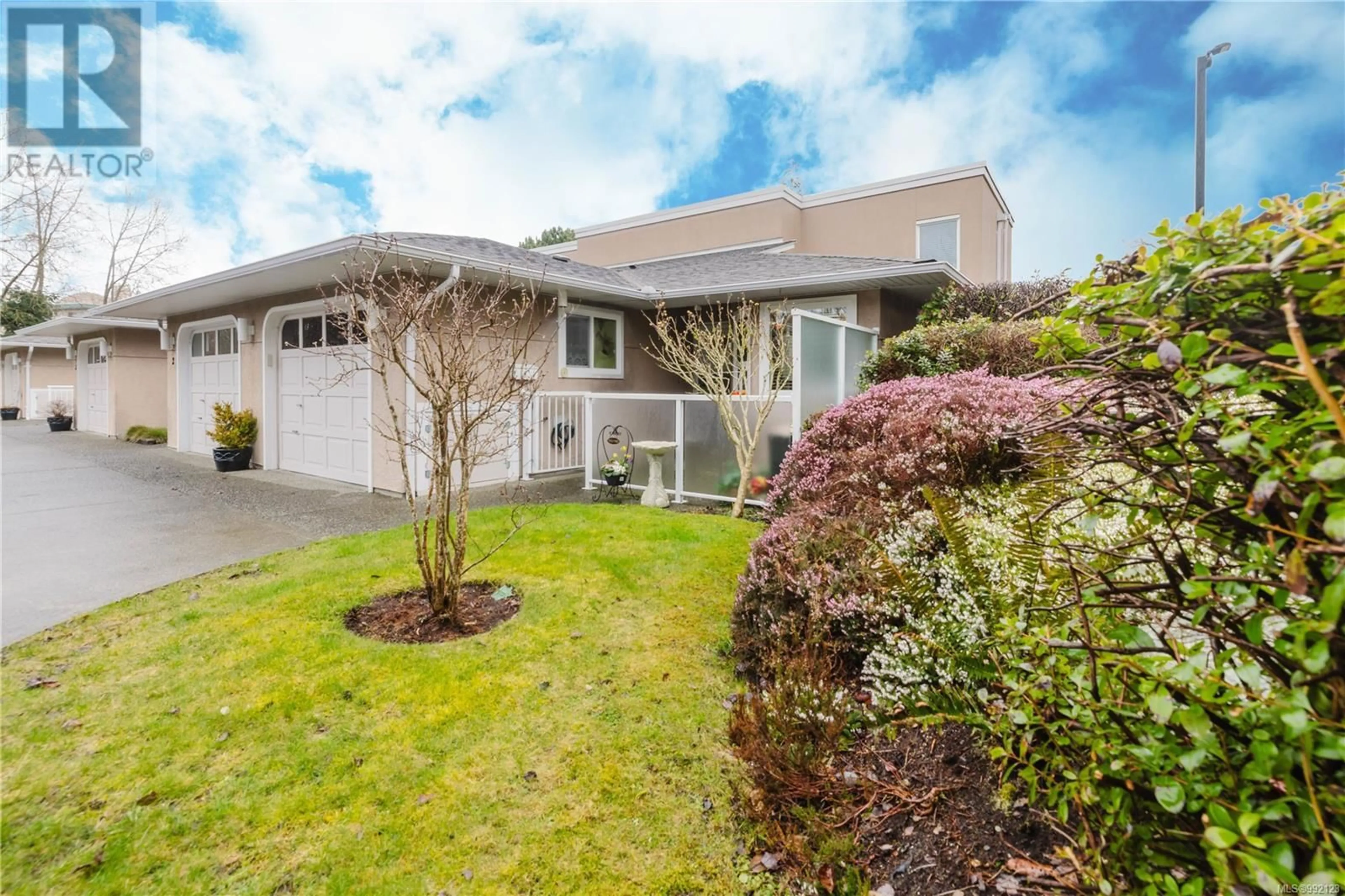 Home with vinyl exterior material, street for 1 - 3049 BRITTANY DRIVE, Colwood British Columbia V9B5P8