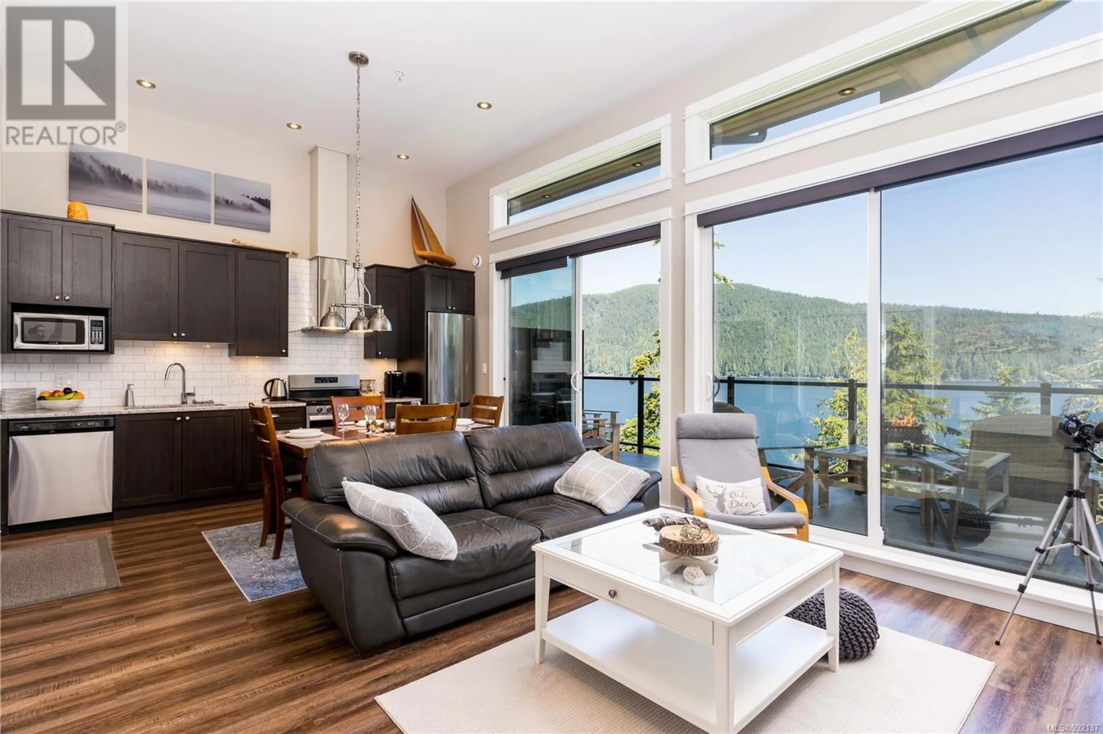 Open concept kitchen, wood/laminate floor for 208A - 6596 BAIRD ROAD, Port Renfrew British Columbia V0S1K0