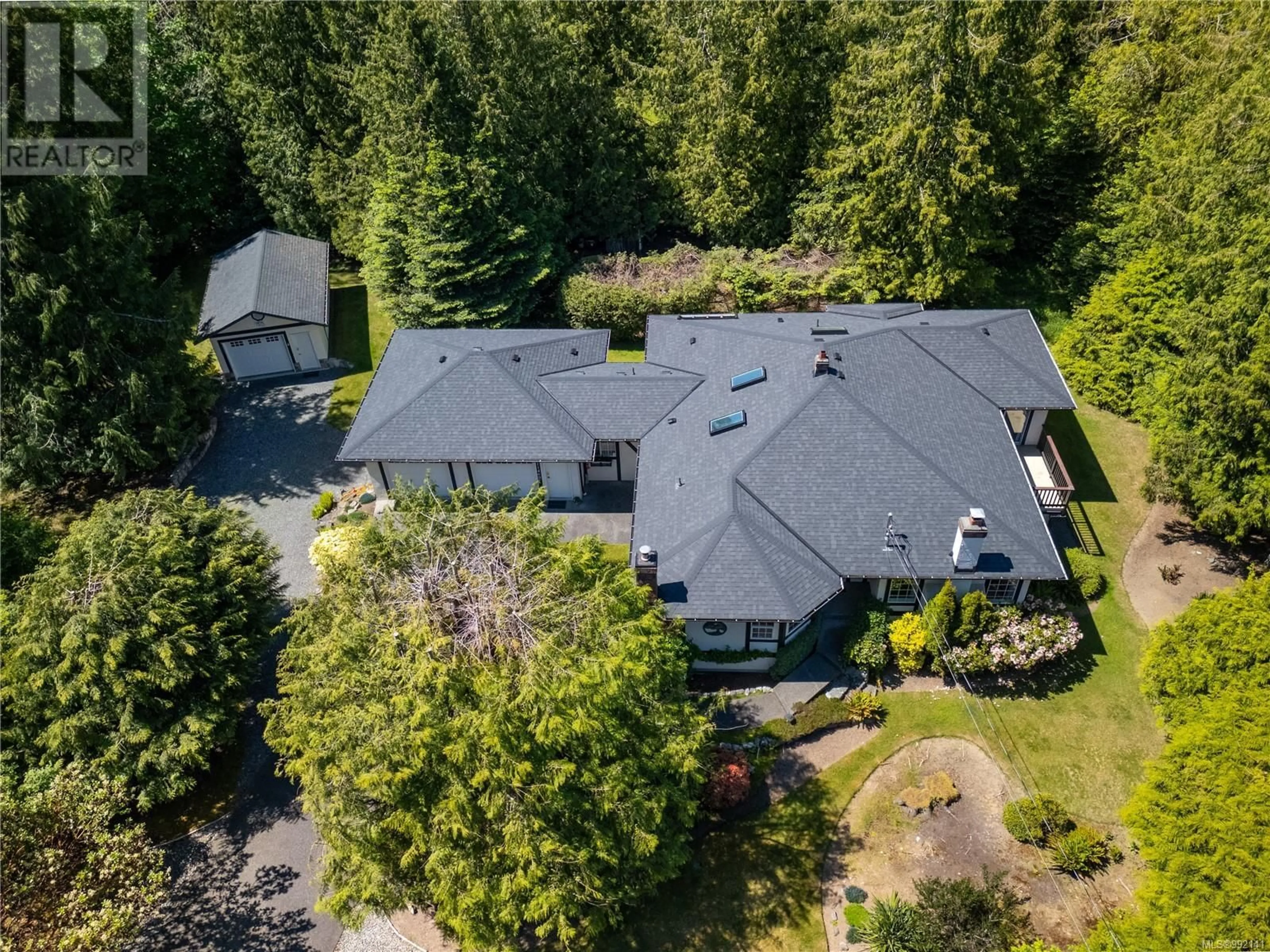 A pic from outside/outdoor area/front of a property/back of a property/a pic from drone, forest/trees view for 11460 HAWTHORNE PLACE, North Saanich British Columbia V8L5J7