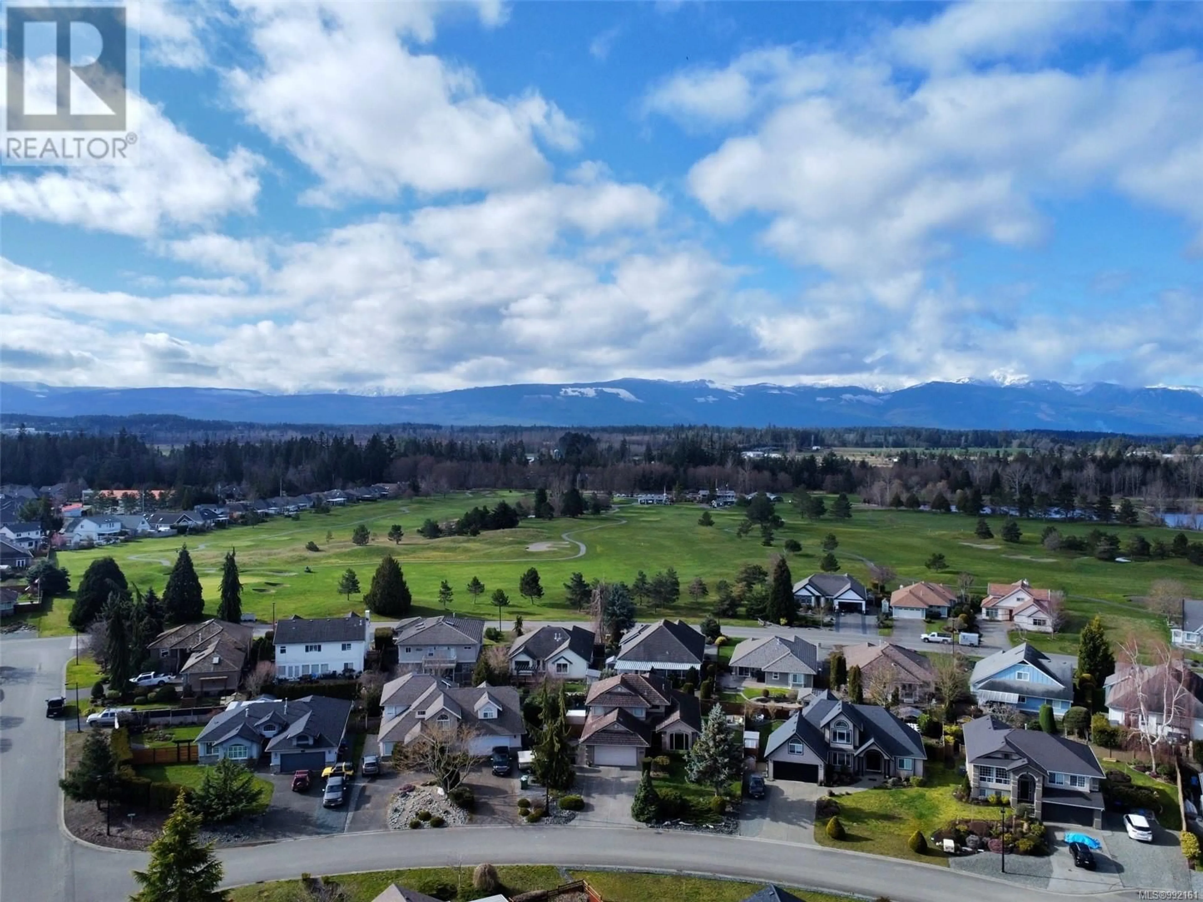 A pic from outside/outdoor area/front of a property/back of a property/a pic from drone, mountain view for 717 ARROWSMITH WAY, Parksville British Columbia V9P2N9