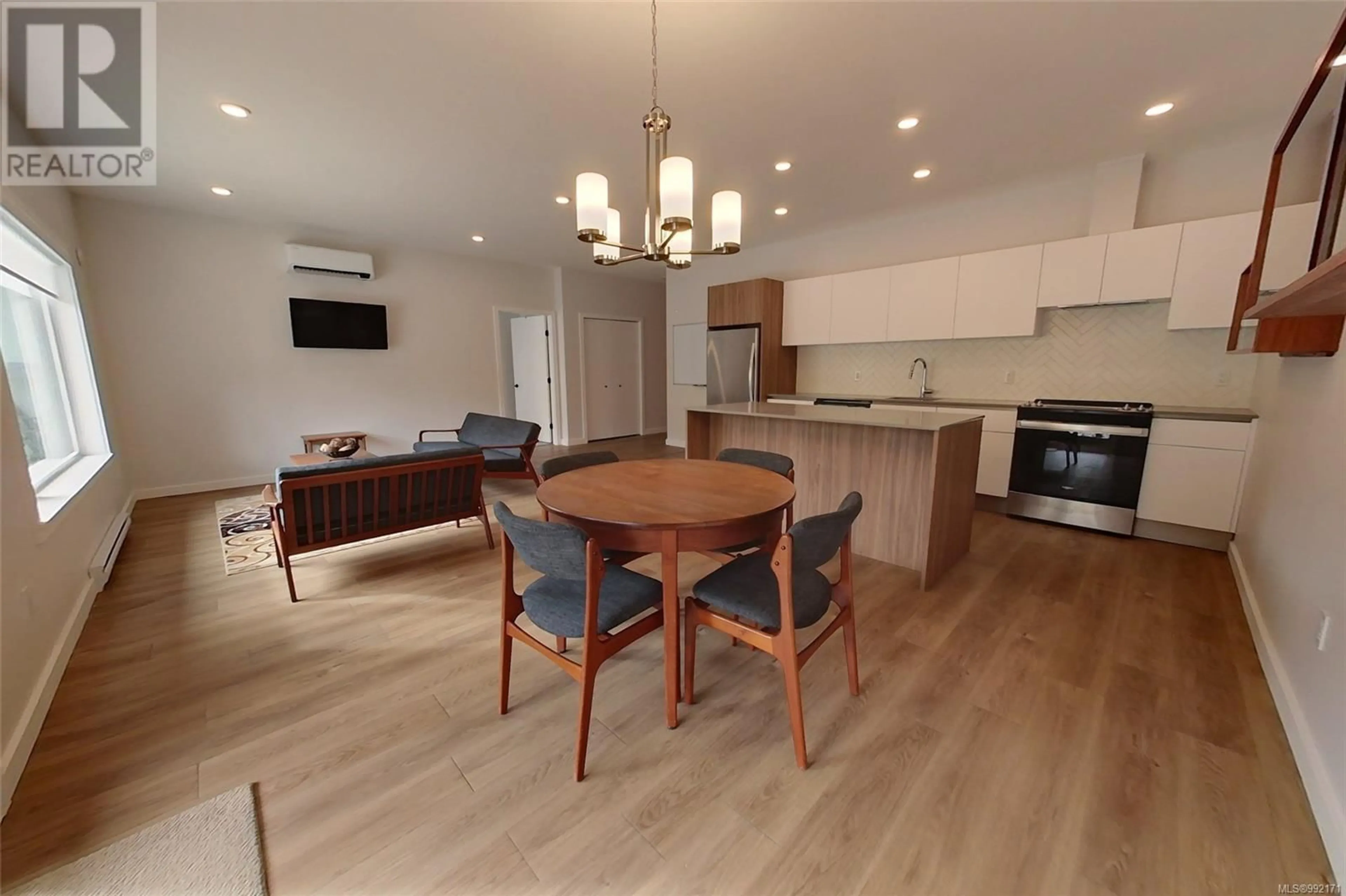 Open concept kitchen, wood/laminate floor for 103-B - 3590 16TH AVENUE, Port Alberni British Columbia V9Y7L9