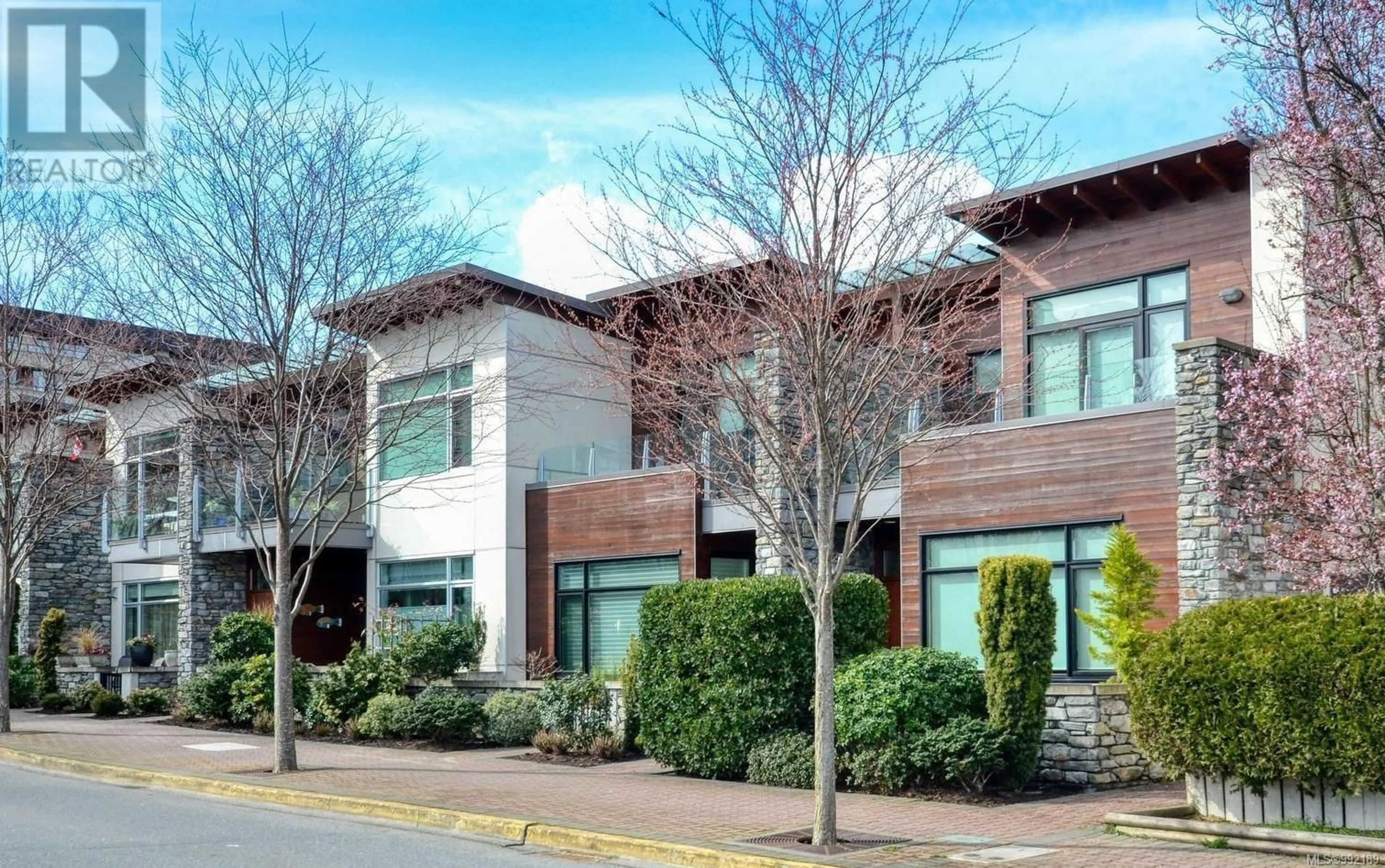 Home with brick exterior material, building for 102 - 9820 SEAPORT PLACE, Sidney British Columbia V8L4X3